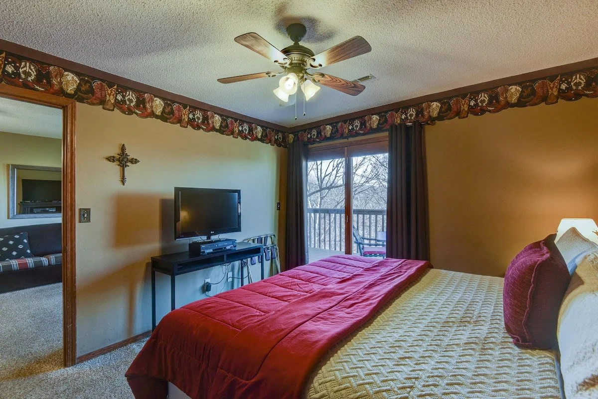 Primary King bedroom with walkout access to the back porch!