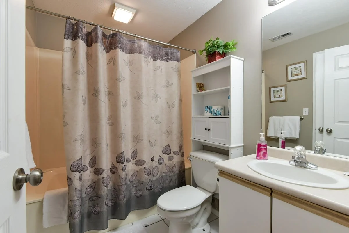 Main guest bathroom w/ secondary door that attaches it to King bedroom.