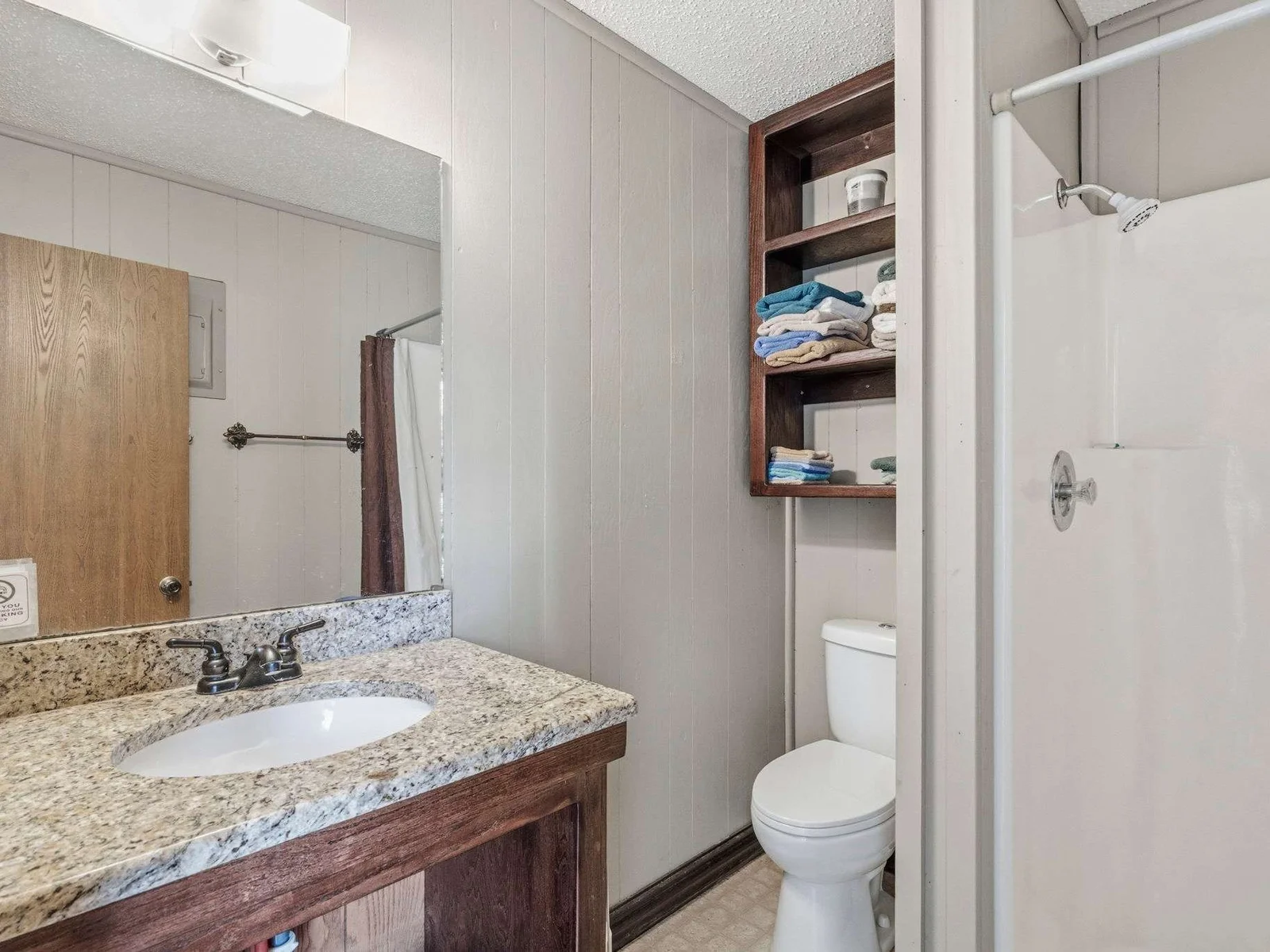 3/4 bathroom with shower stall
