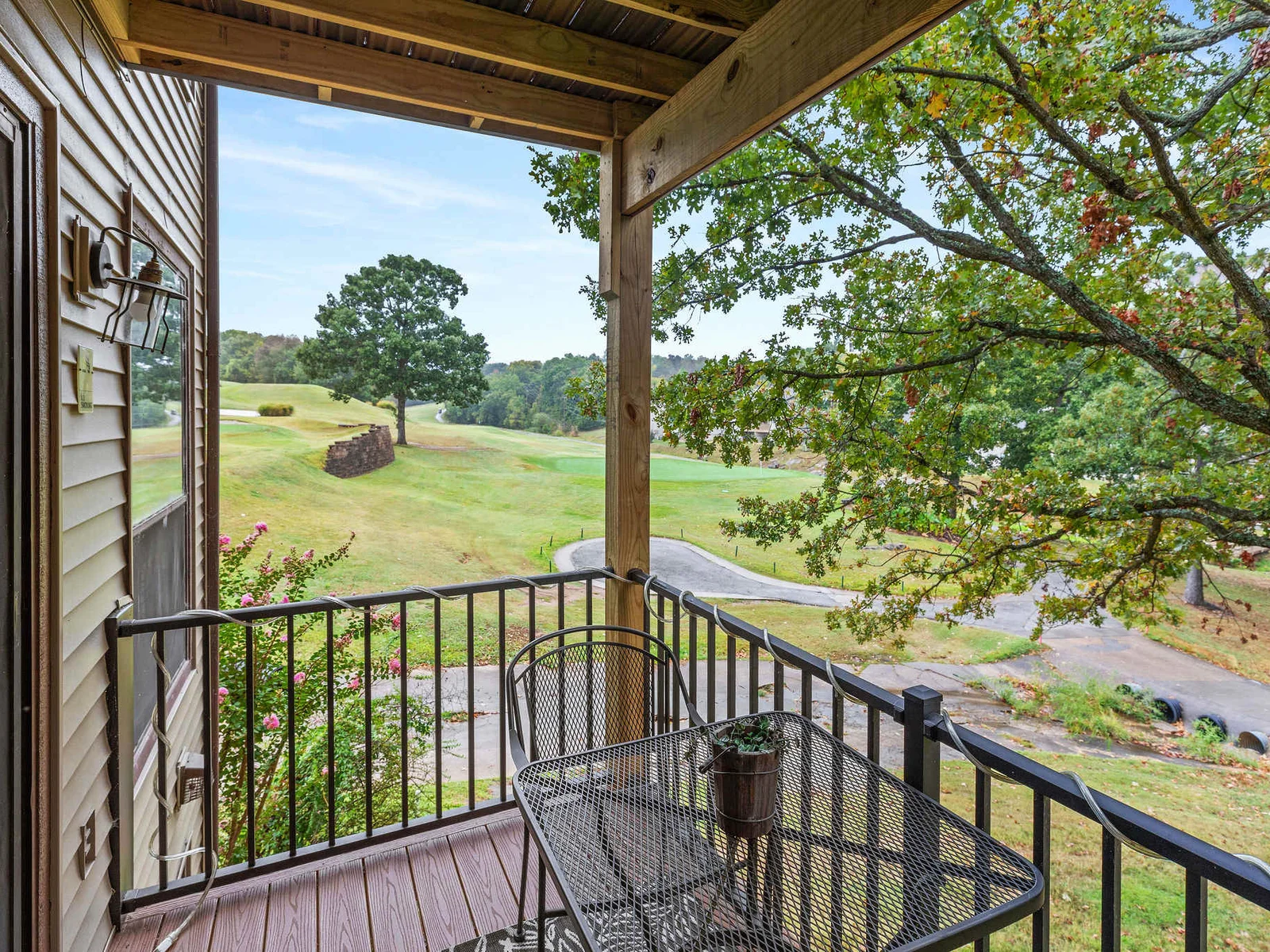 Balcony seating. This condo is located on the second floor, which boasts a gorgeous view overlooking the golf course. There are approximately 10 steps.