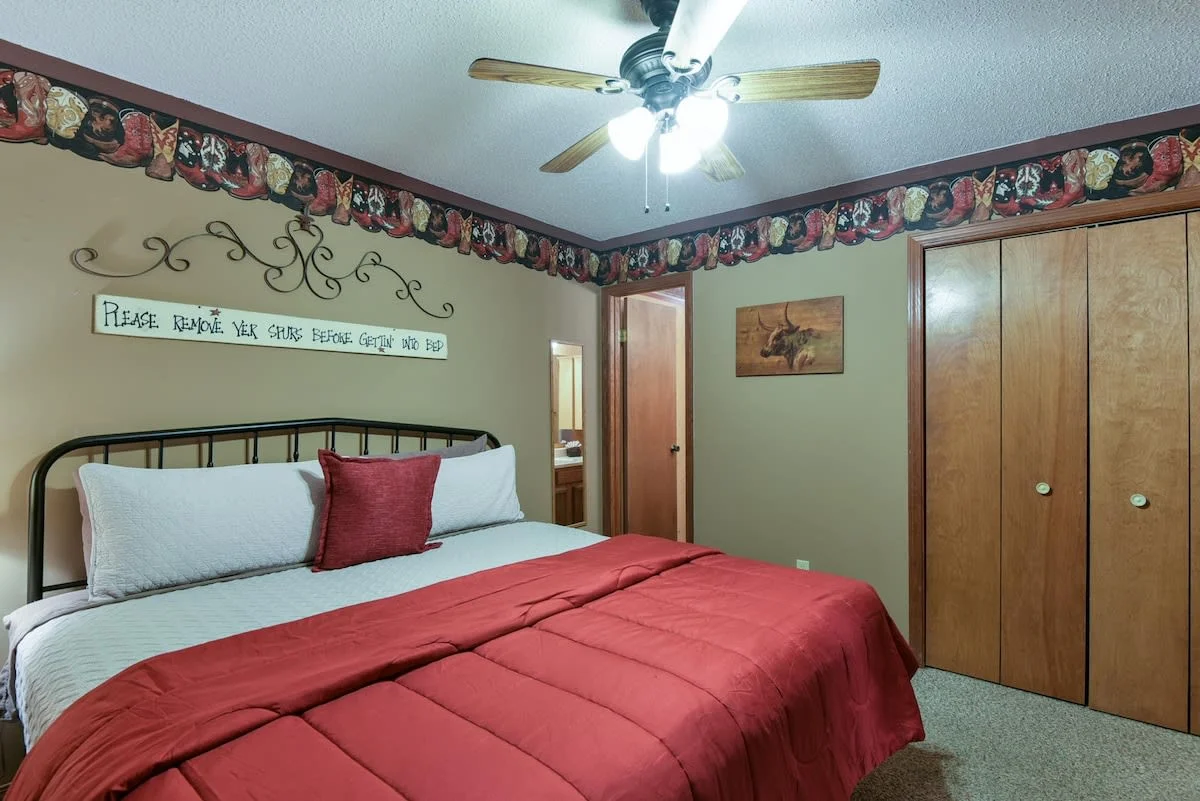 Primary King Bedroom with attached bathroom & walkout accress to the back deck!