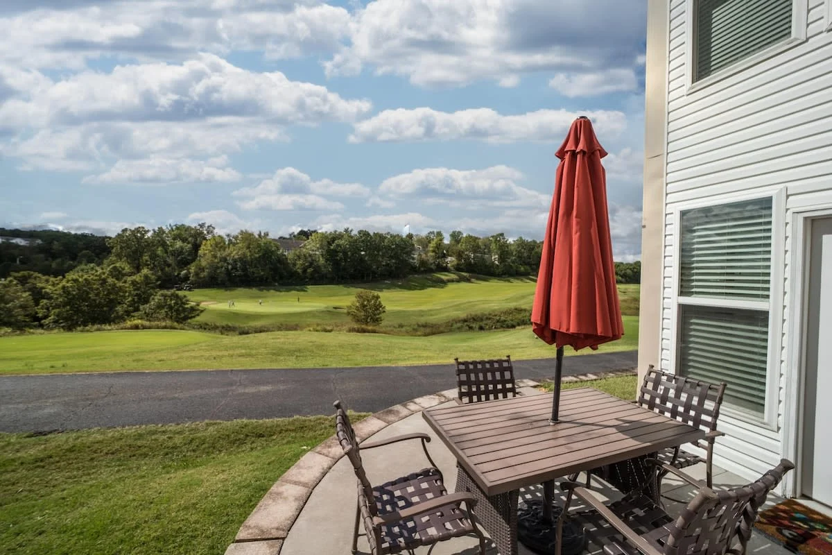 Patio seating overlooking the golf course.