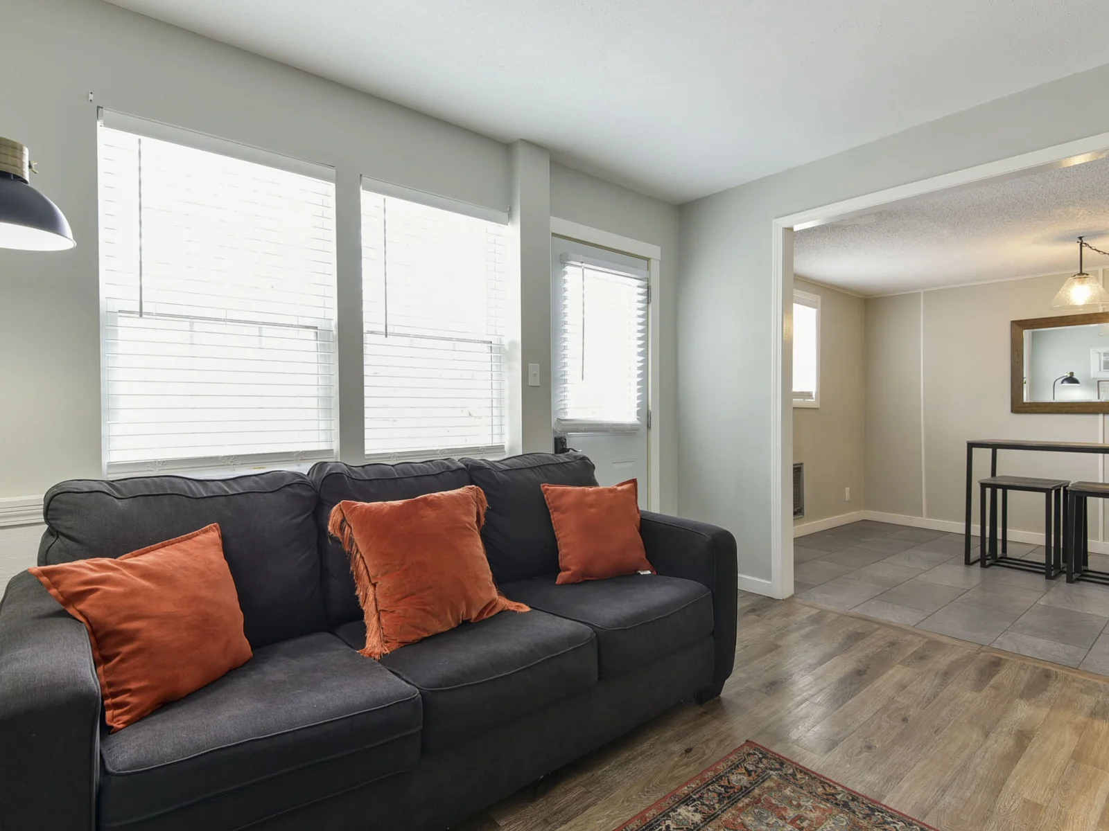 Living room with a view of the kitchen area.