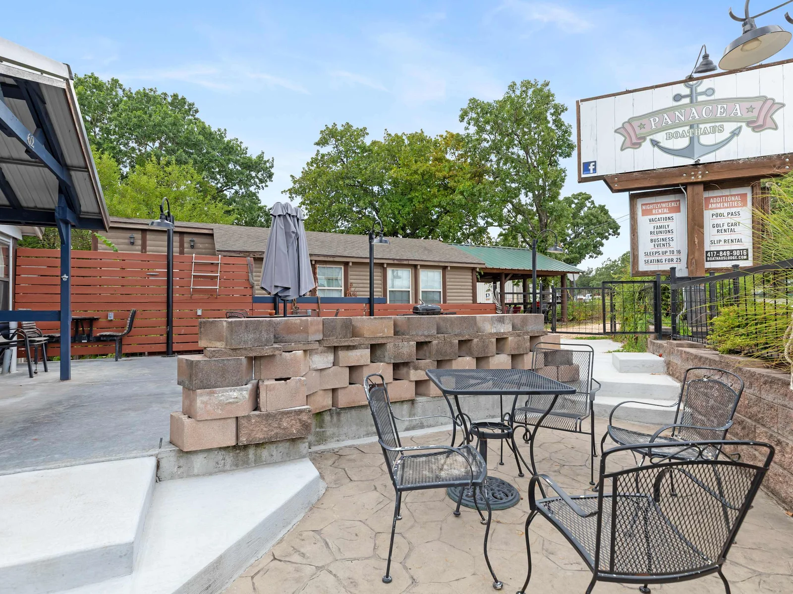 Another view of the patio area with table and seating