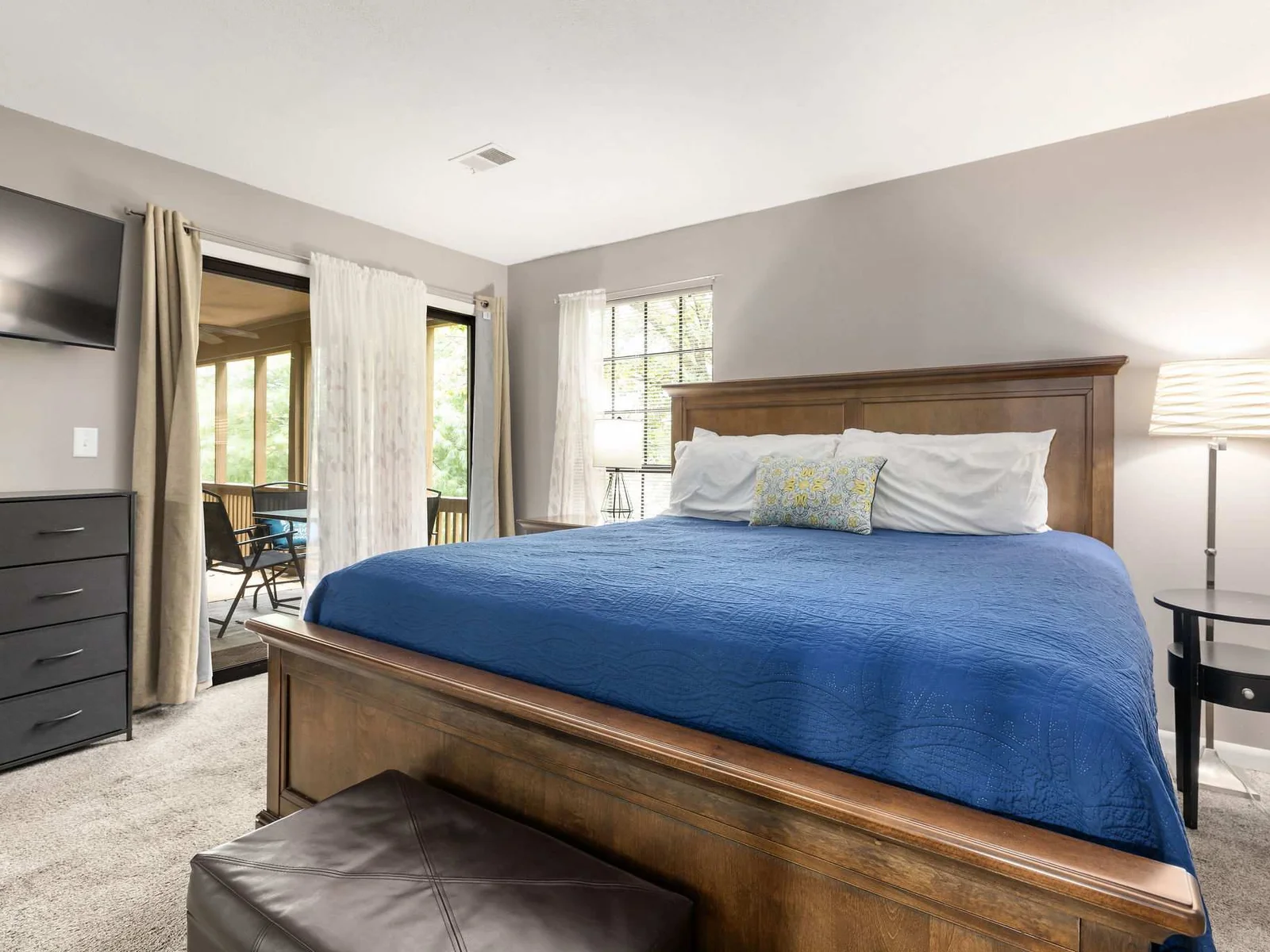 Primary bedroom with walkout access to the balcony