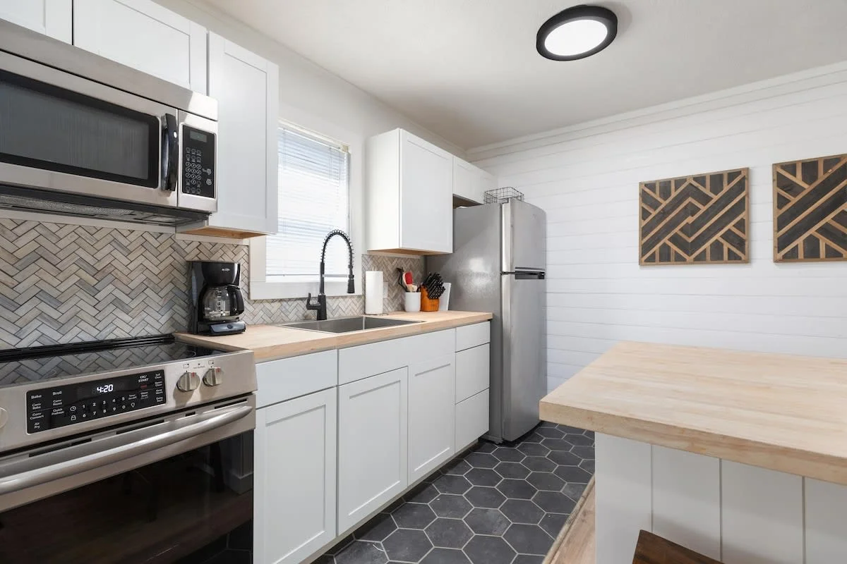 Kitchen stocked with all your basic cookware and utensils