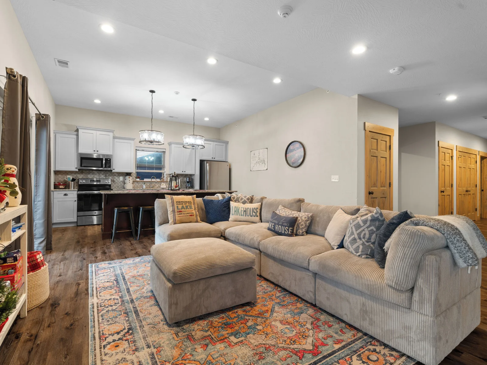 Lower level FULL kitchen. Refrigerator, dishwasher, oven/ceramic glass cooktop, microwave, drip coffee maker, Keurig, and Nespresso. Stocked with small appliances, cookware, bakeware, utensils, dishes, glassware, mugs, and more!