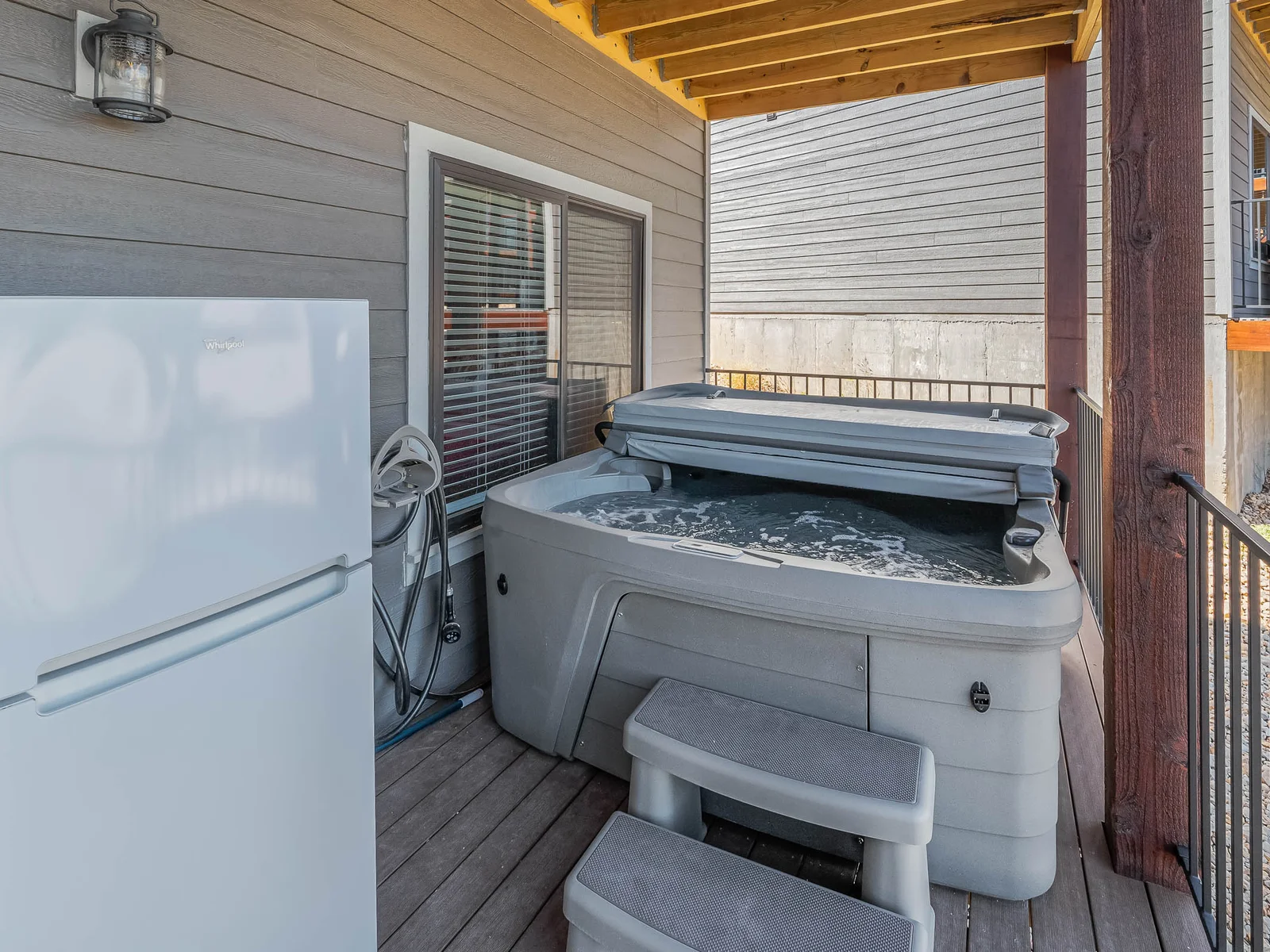 Private hot tub and full size fridge
