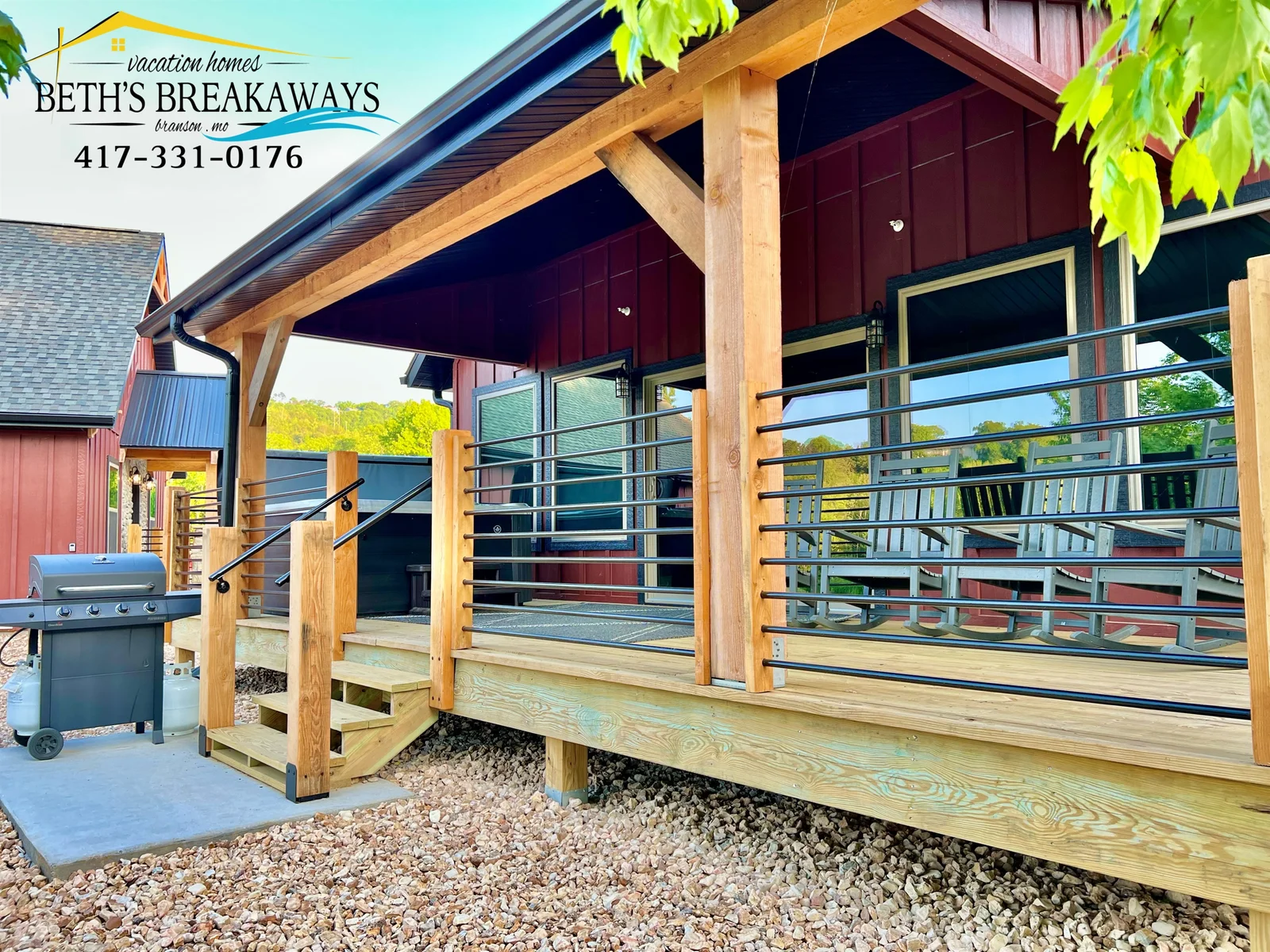 Trout Hideaways back porch just steps away from walking trails along the lake!