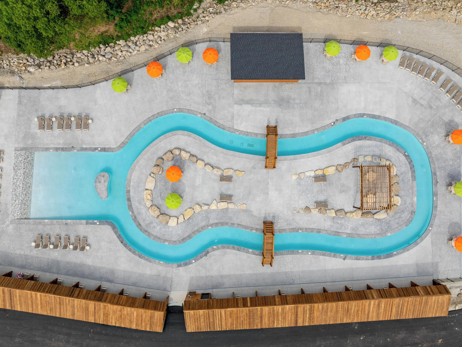Third pool towards the back of the camp. It is a lazy river! A long walk or you can get there by car with ample parking or golf cart.