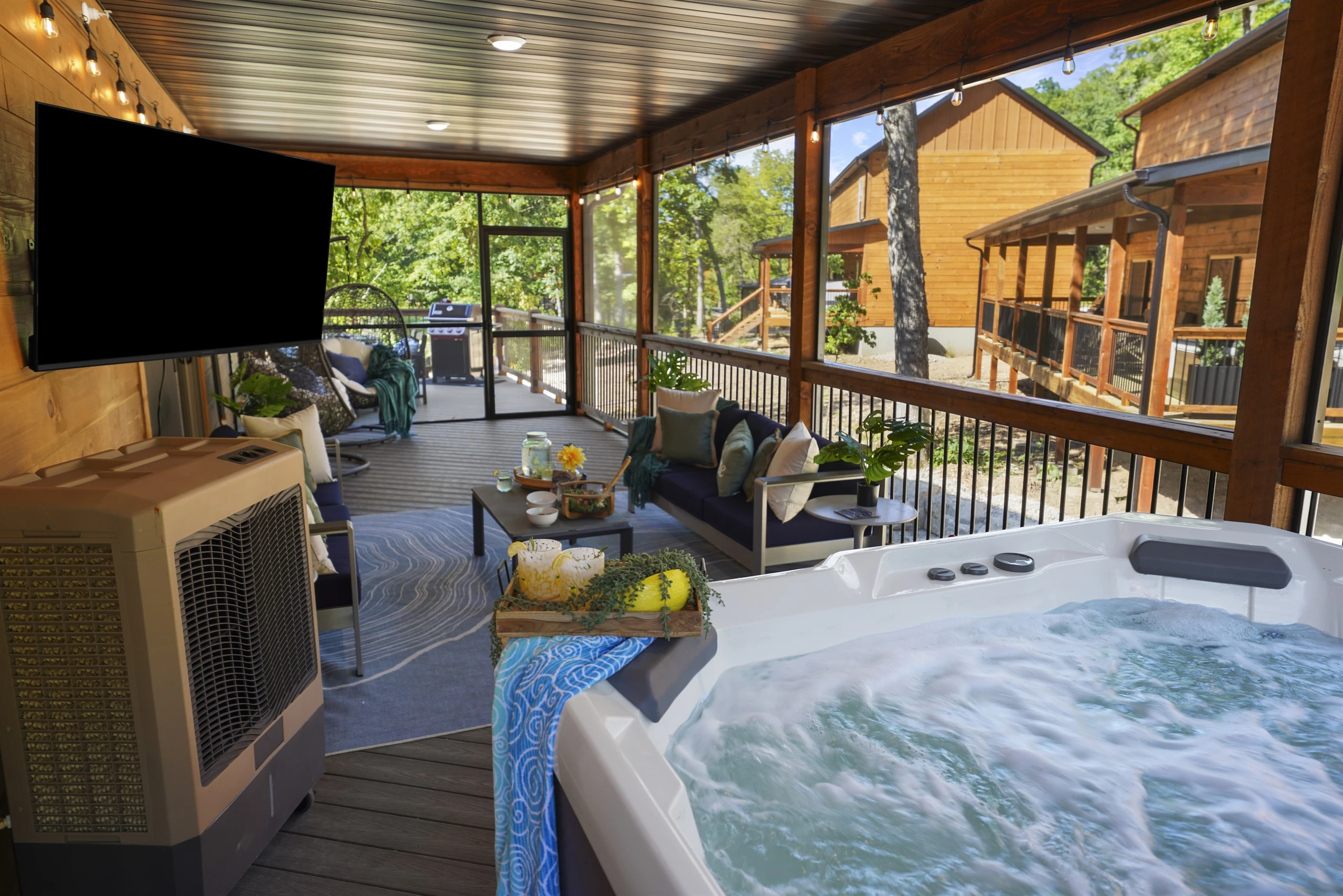 The huge deck runs the entire length of the house with 2/3 covered and screened in!