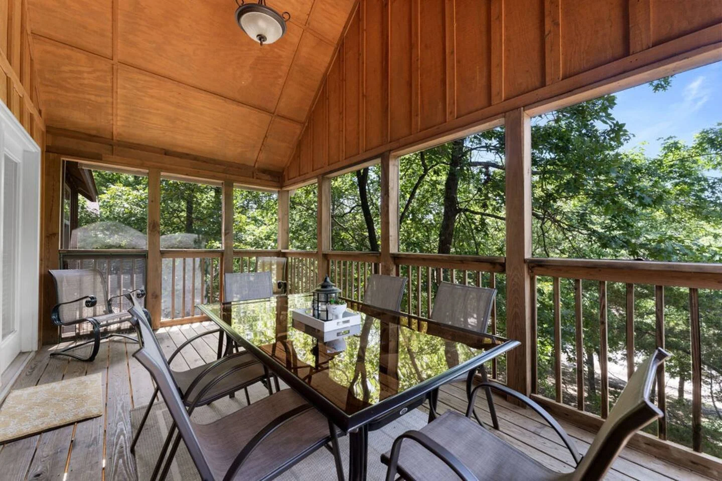 Beautiful screened in porch to relax and enjoy nature without the bugs!