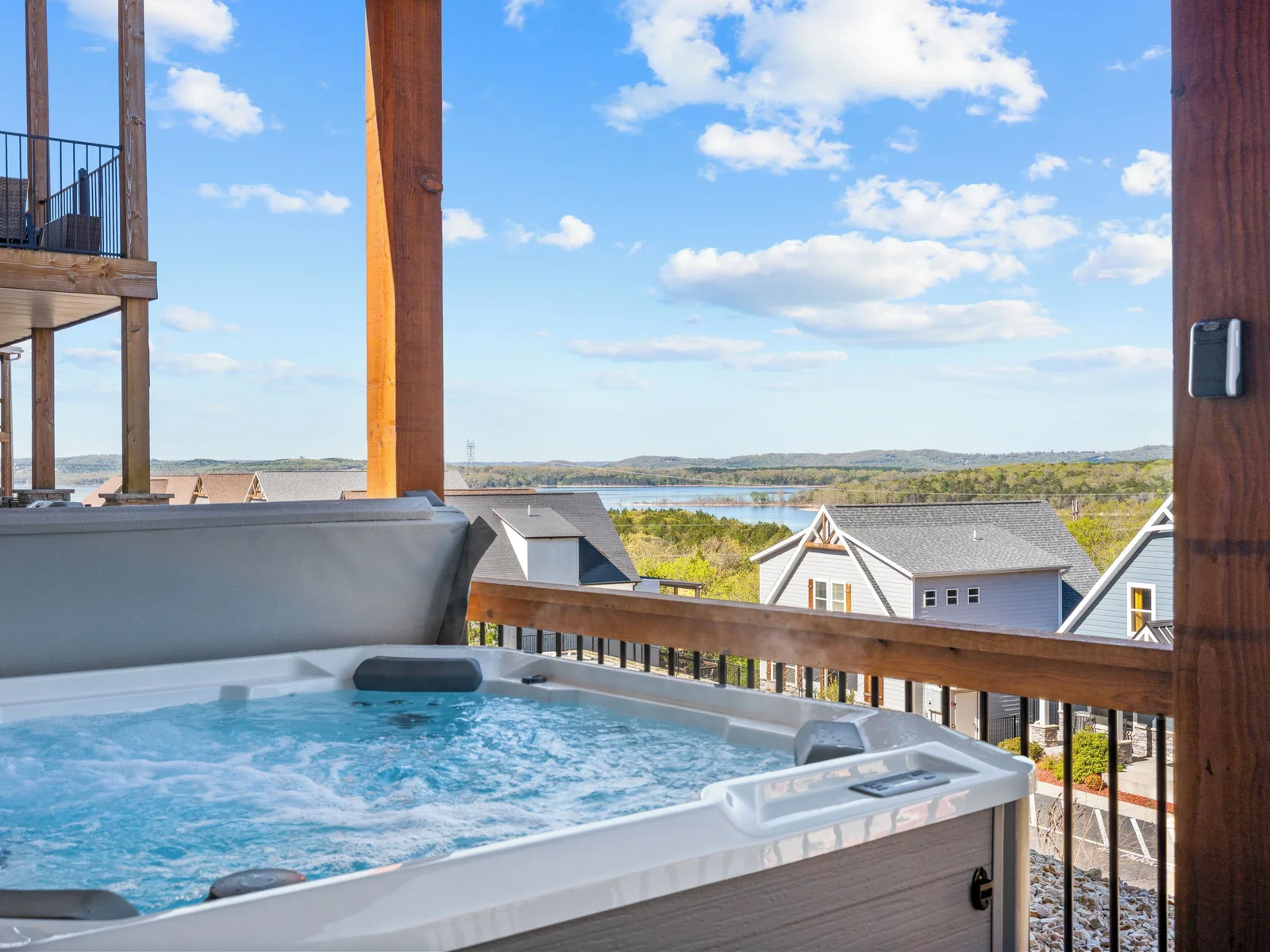 Wellness porch. 7-person Hot Springs Hot Tub overlooking our quiet cove on Table Rock Lake.