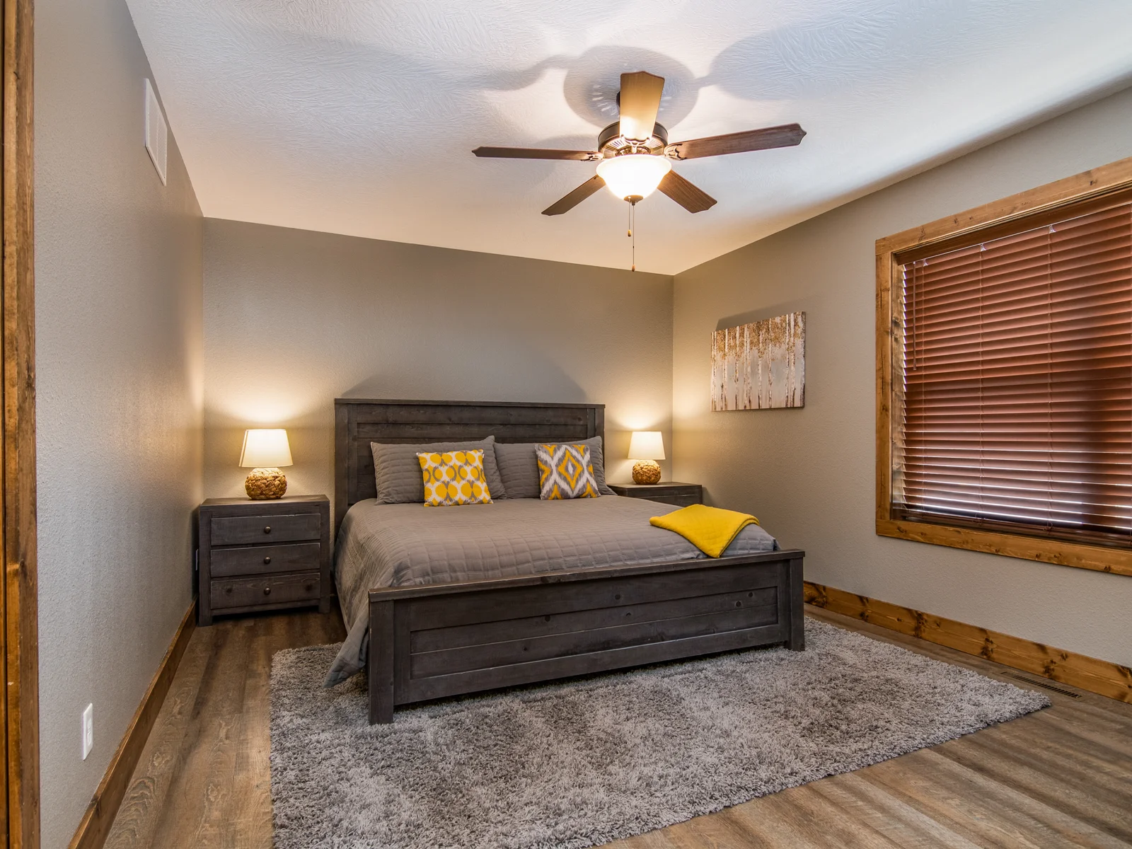 King size bed in one of our four spacious bedrooms