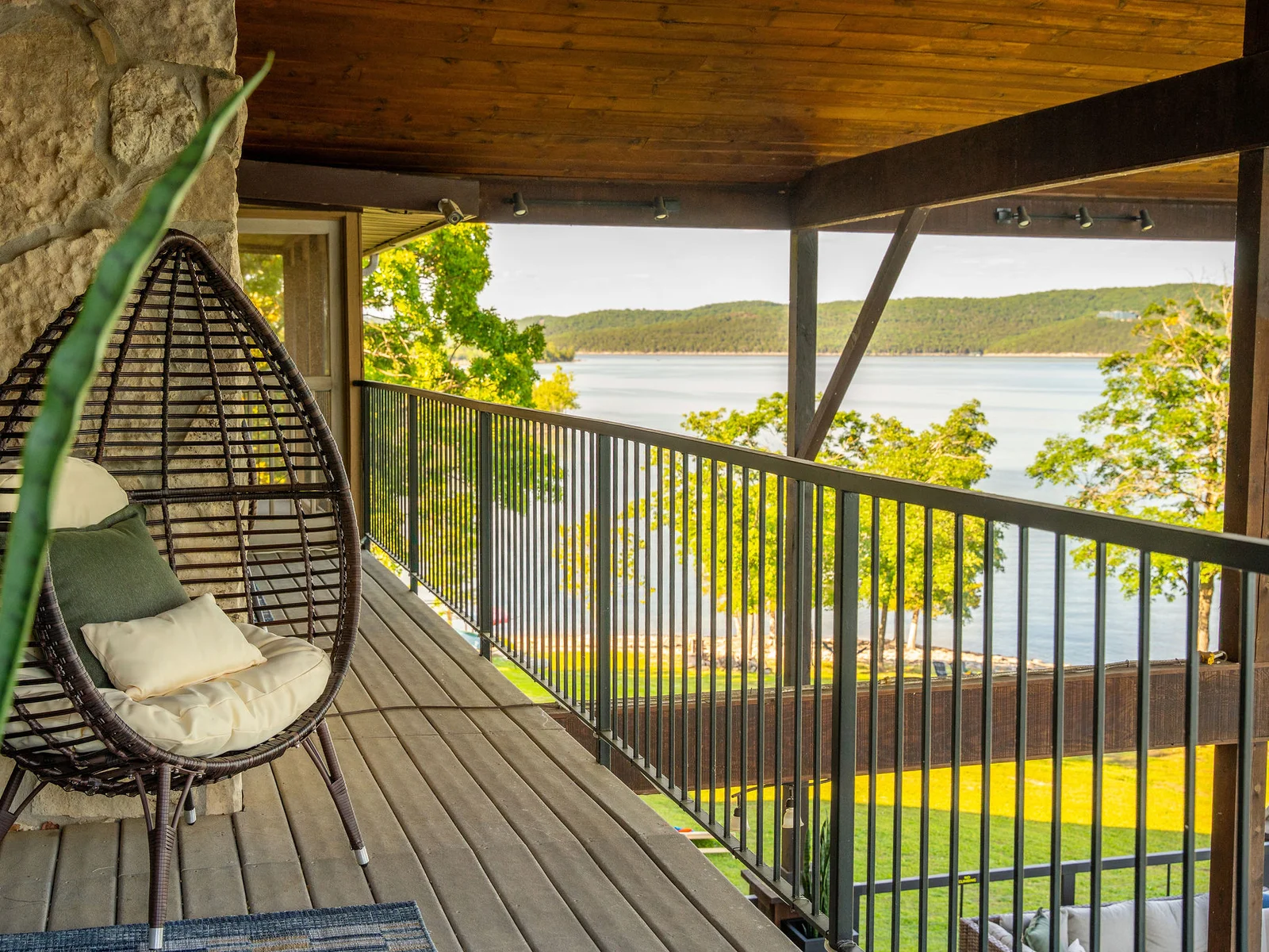 Curl up in the hanging chair on the upper deck and enjoy peaceful mornings overlooking the water.
