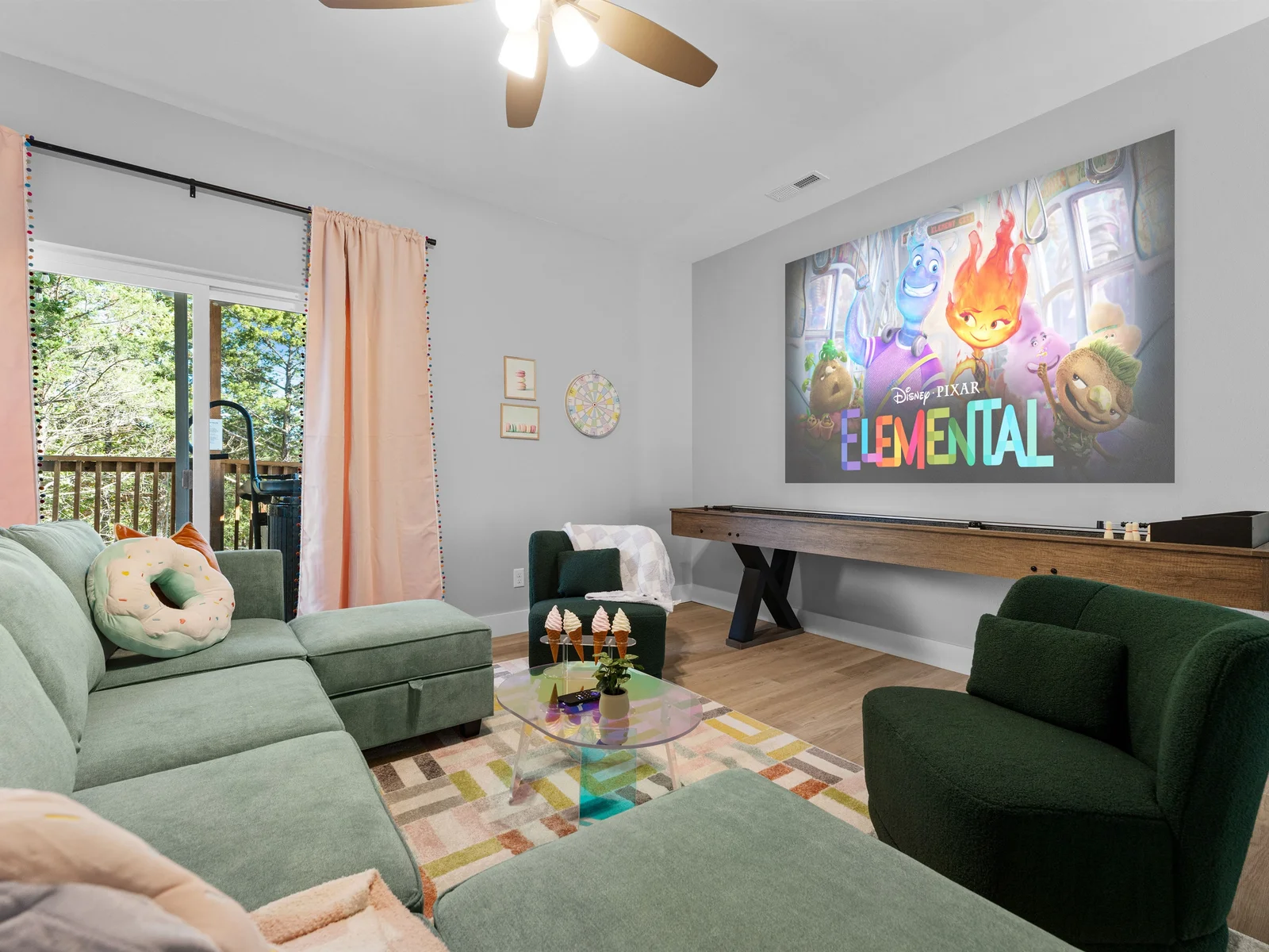 Dive into fun movie nights with plush seating and a vibrant projector screen!