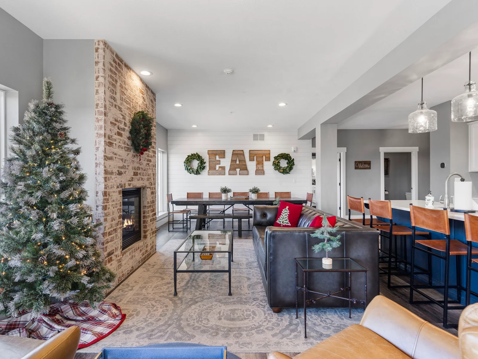 Open dining, kitchen, and living space on the main level. Main is ADA accessible
