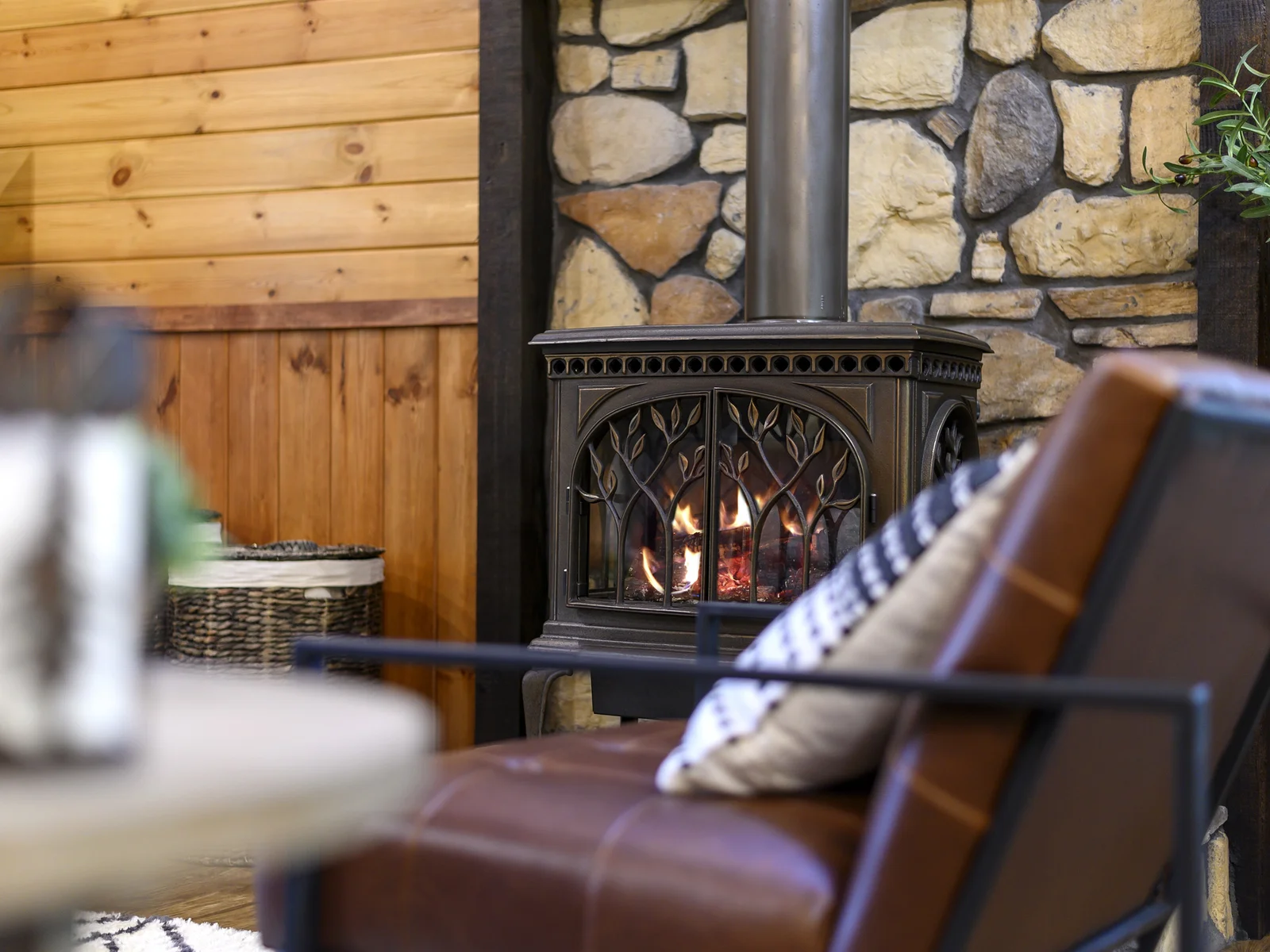 Amidst the winter's chill, the pot belly stove breathes life and warmth into the cozy living room. ***Available seasonally***