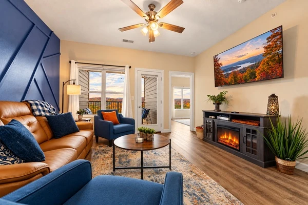After a full day of Branson adventures, unwind in the main floor living room, snuggle up with a book by the fire, and enjoy time together with beautiful Ozark views just outside