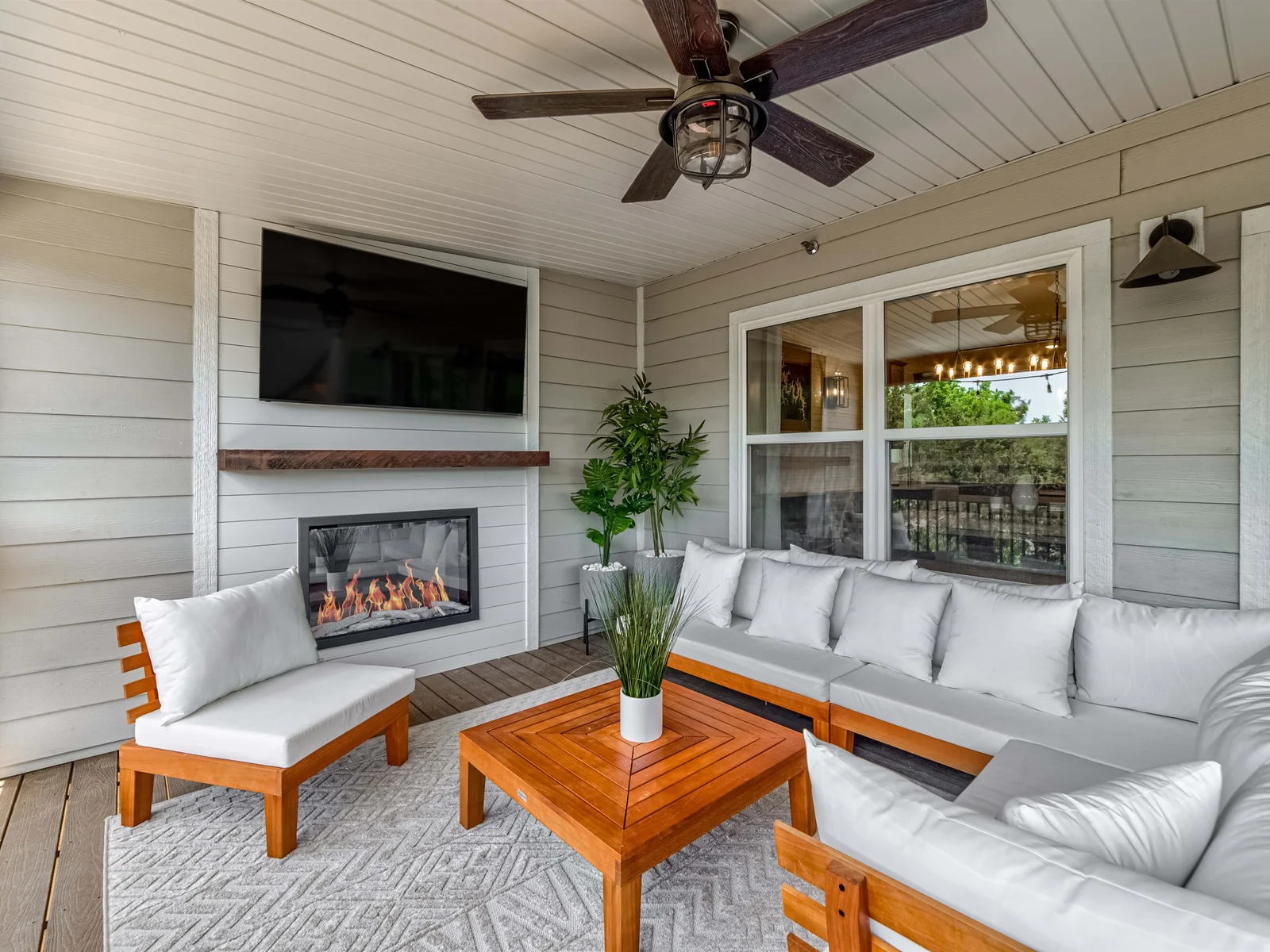 Outdoor fireplace and fans will keep you comfortable in most weather