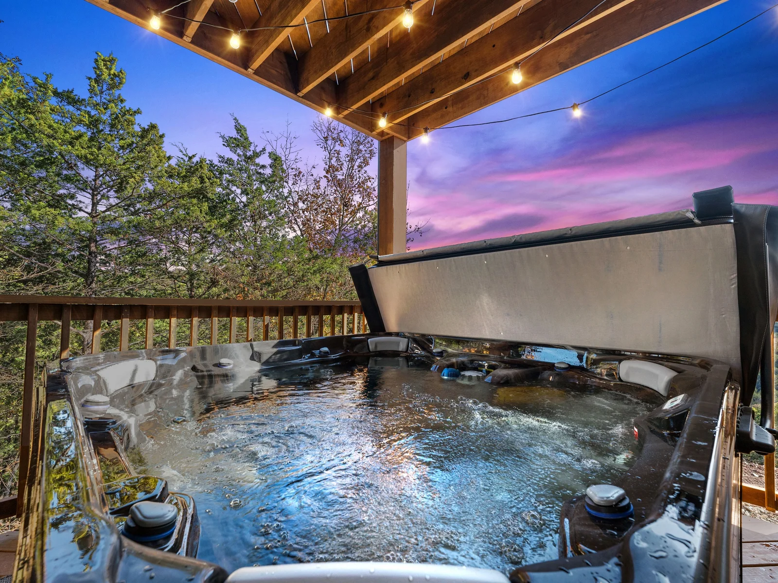 Hot Tub Retreat: Unwind in this bubbling oasis under twinkling lights and vibrant sunsets!