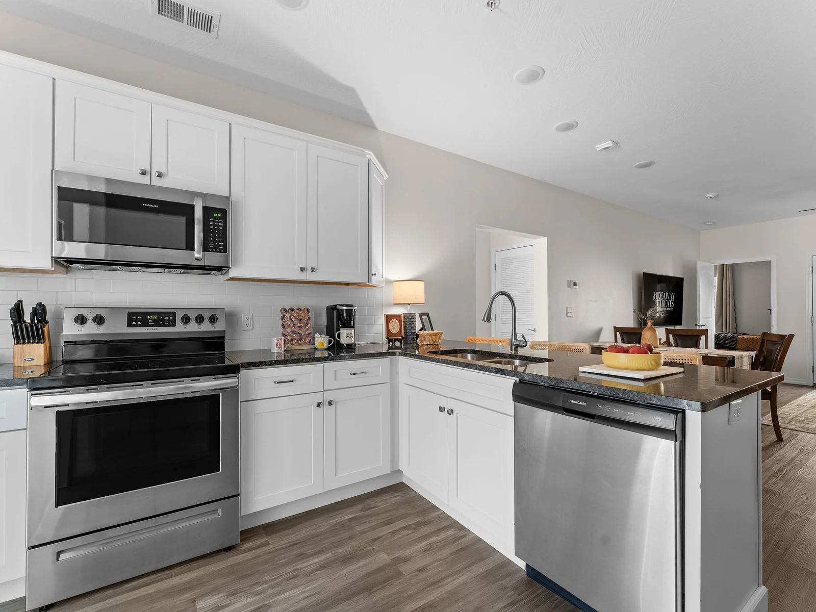 Full-size stainless appliances, a Keurig, and everything you need for real cooking — not just reheating. Feeds 8 people without anyone waiting for a turn.