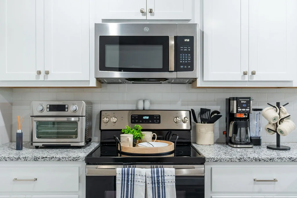 Fully stocked kitchen with new stainless appliances