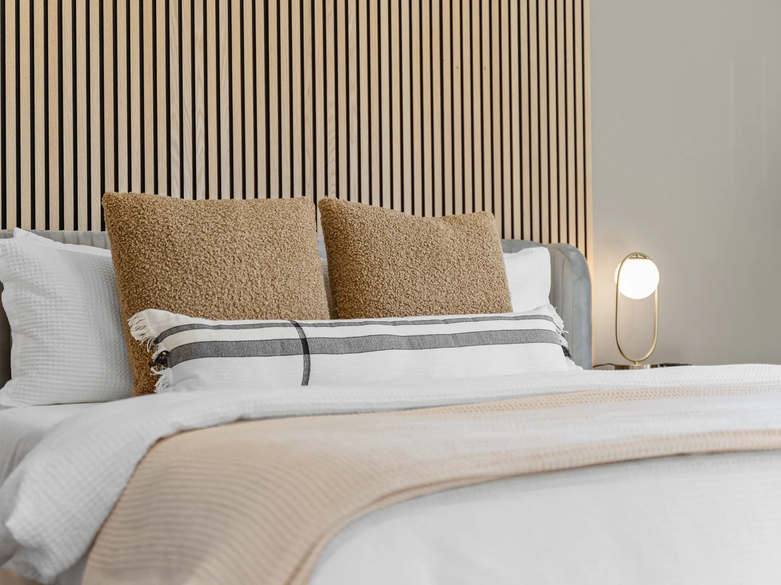 Bedroom Retreat: Experience modern elegance with plush bedding and soothing decor!