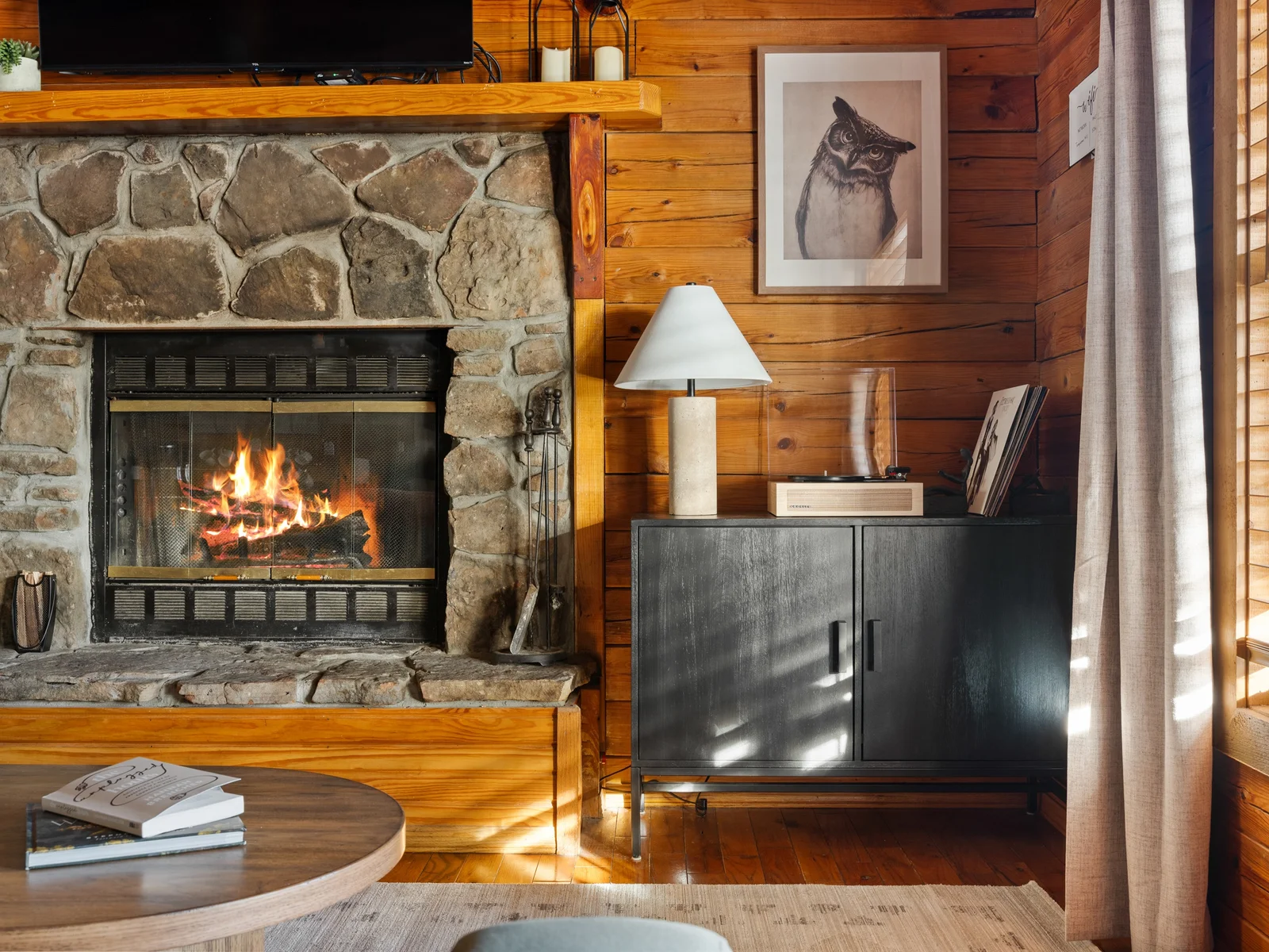 Let the fire’s crackle and timeless records serenade your romantic escape