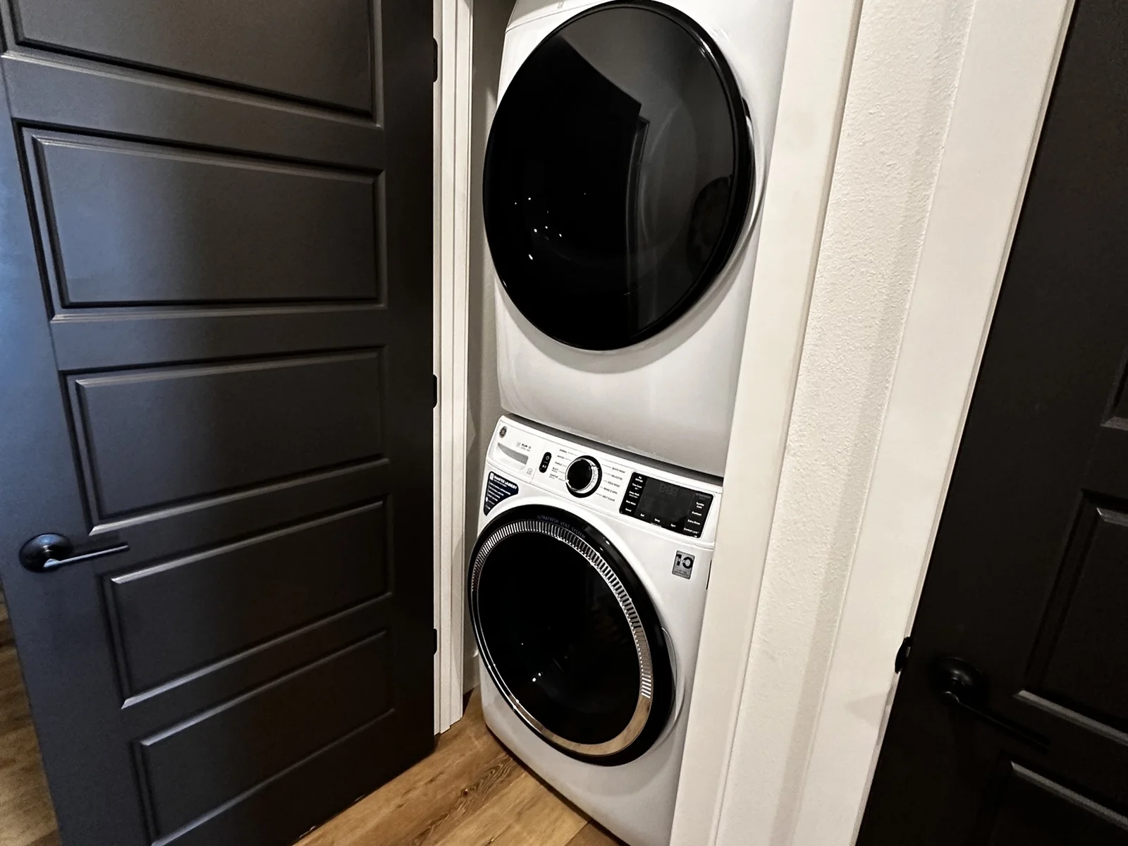 Two sets of washers and dryers-located on ujpper and lower levels