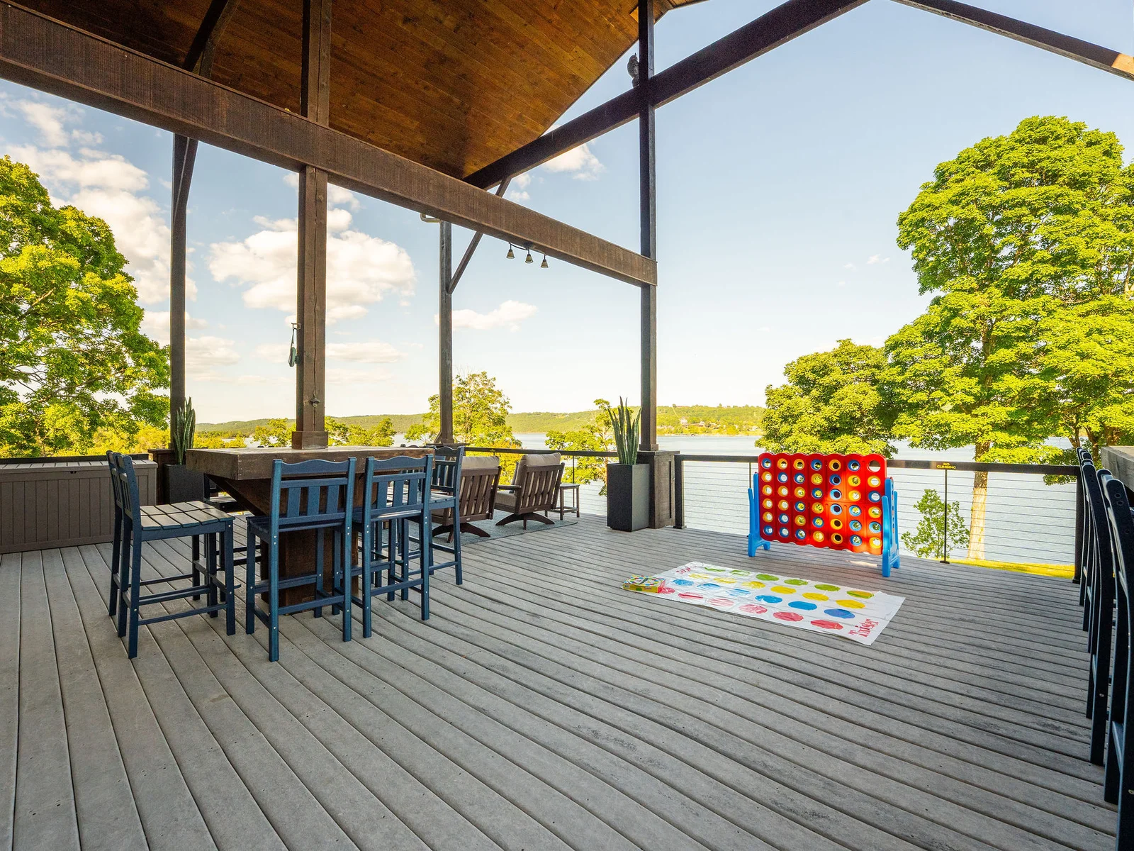 Spacious deck with games, dining, and room to gather, because the best vacation moments happen outside.