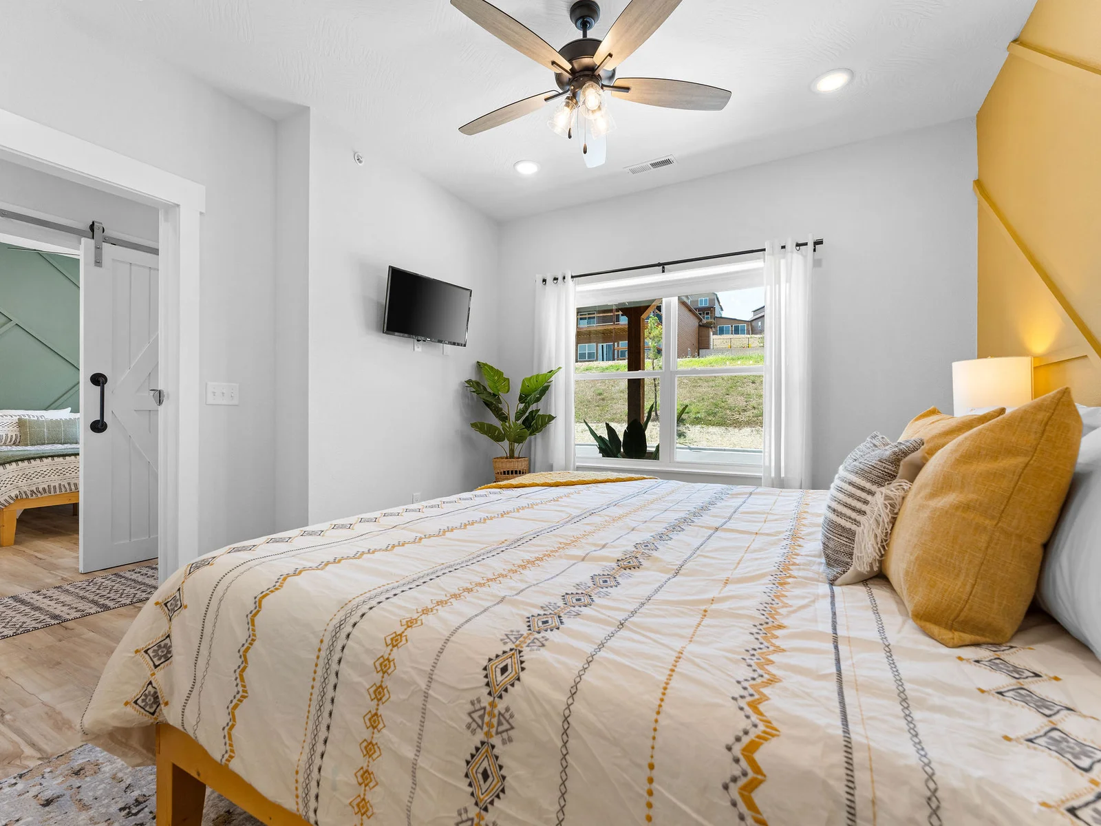 Main level king bedroom w/ ensuite bath