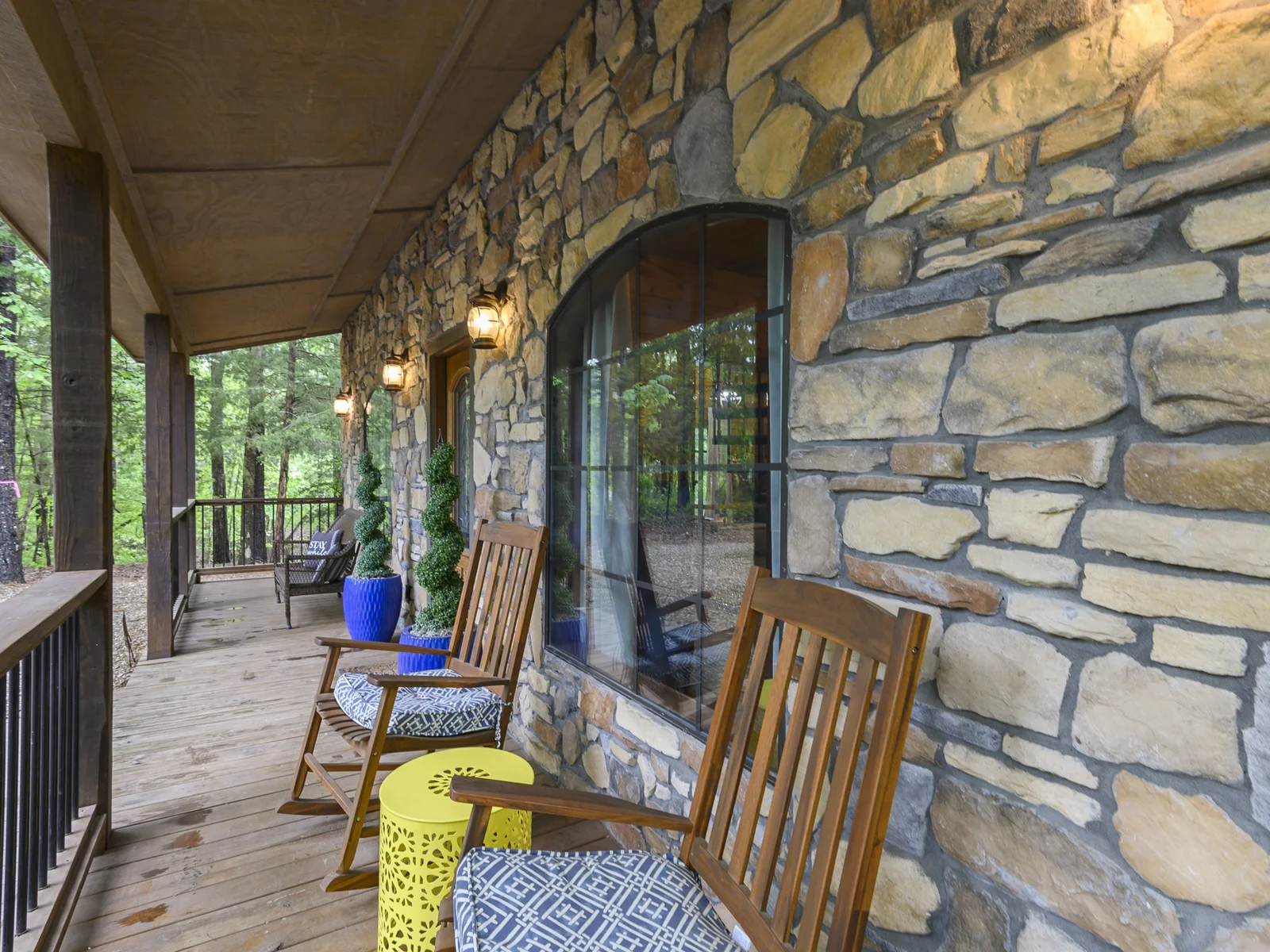 Front Porch Vibes: Rocking Chairs and Woodland Views