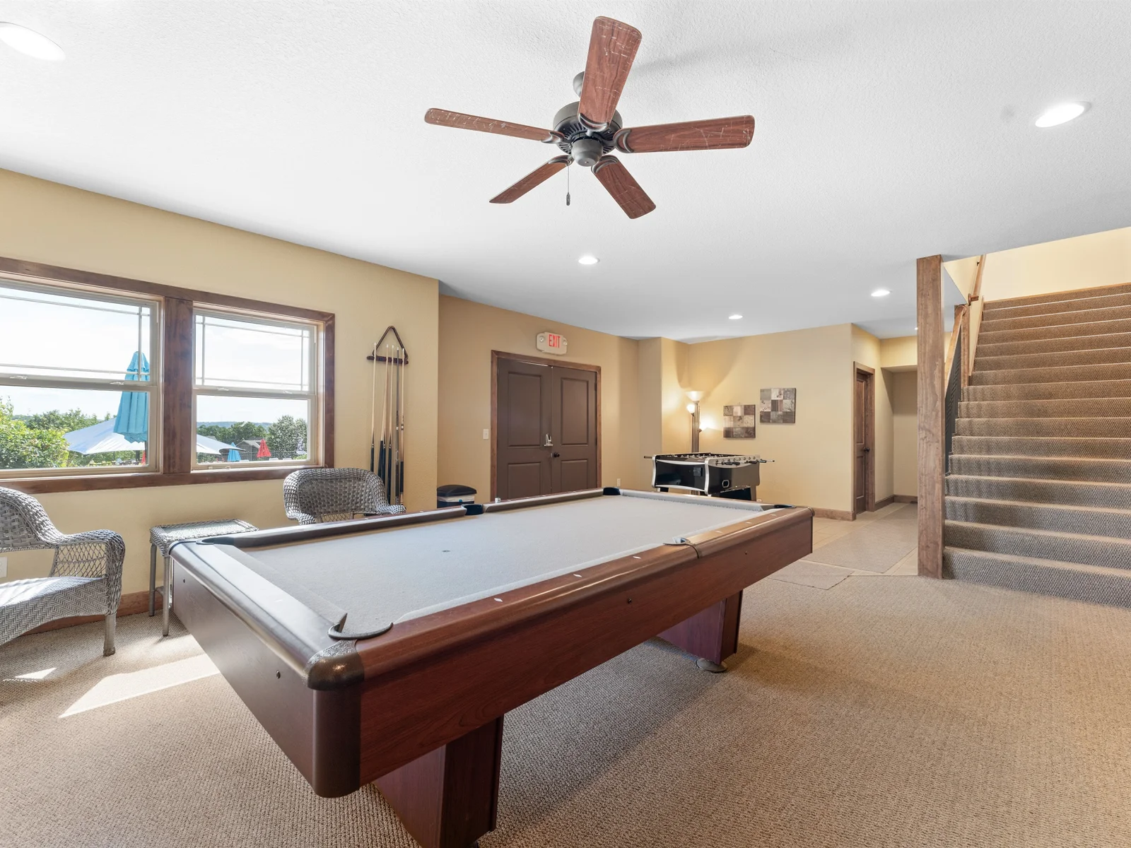 The Clubhouse Game Room has a pool table and fooseball
