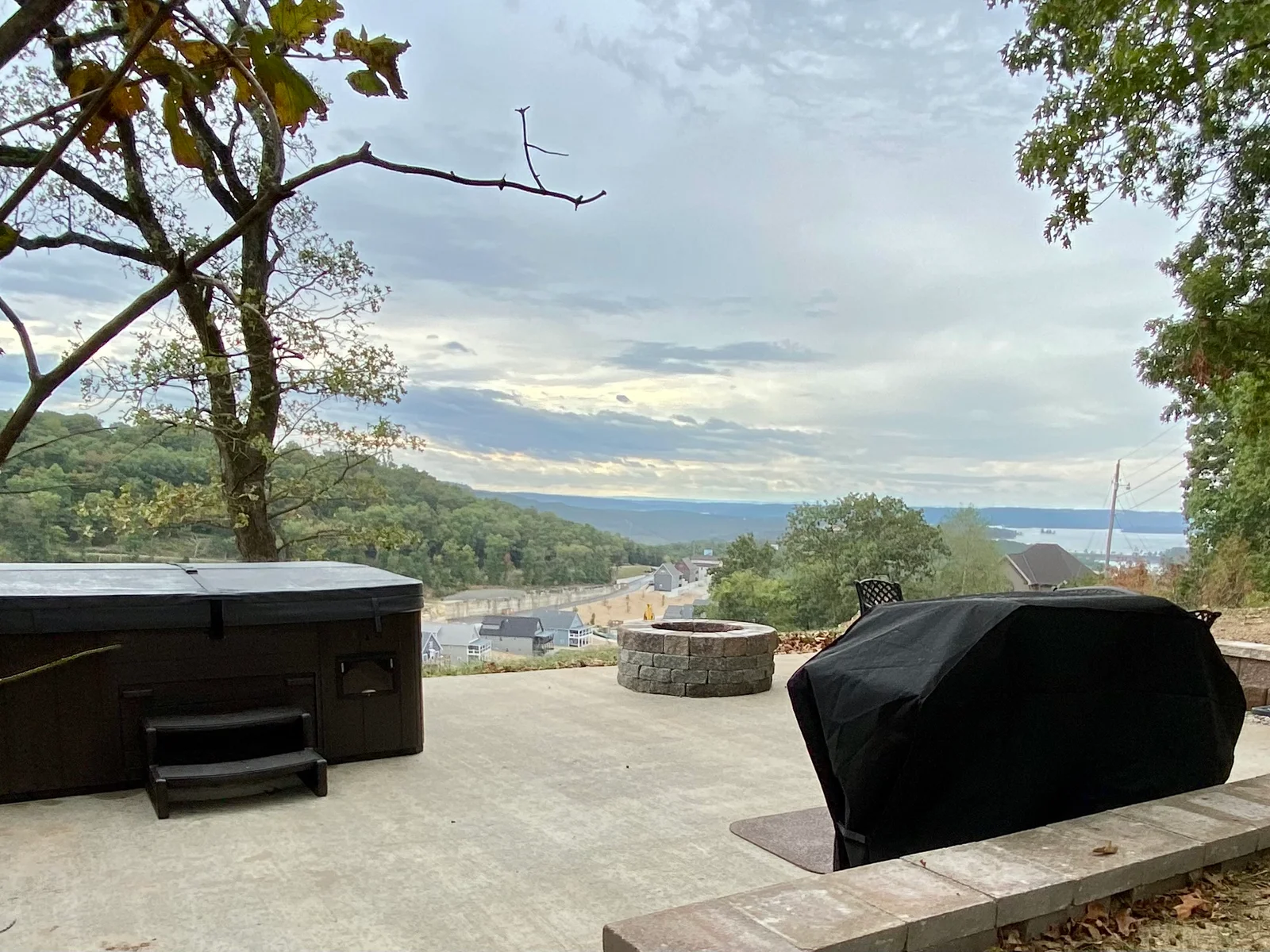 Private hot tub and fire pit with a lake view!