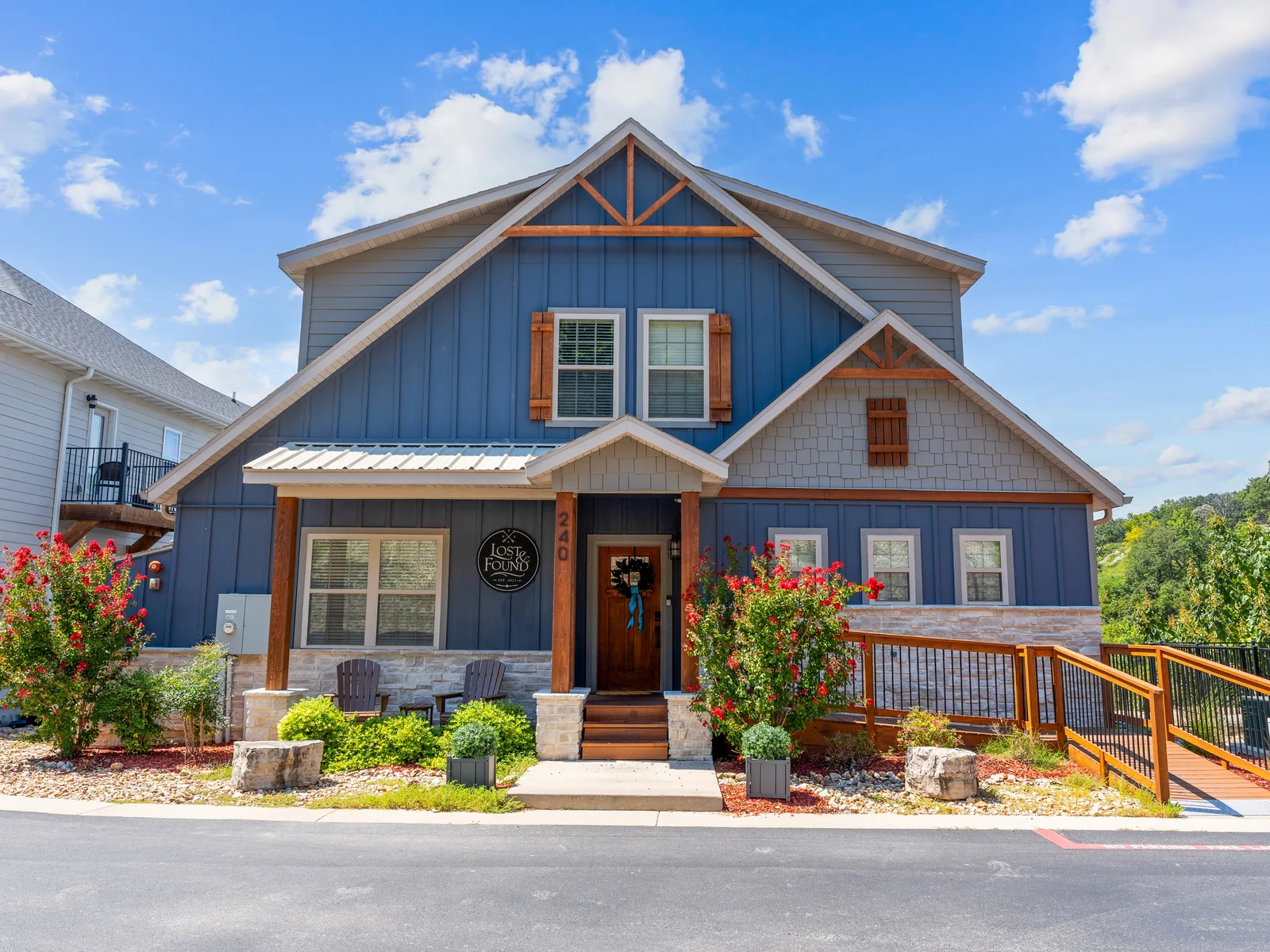 Front elevation of our lodge. There are eight parking spaces directly across from this front porch.