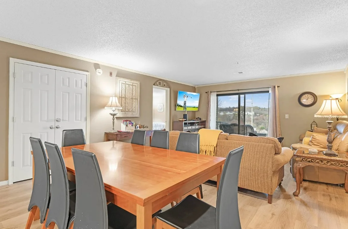 Open dining and living space with Patio view.