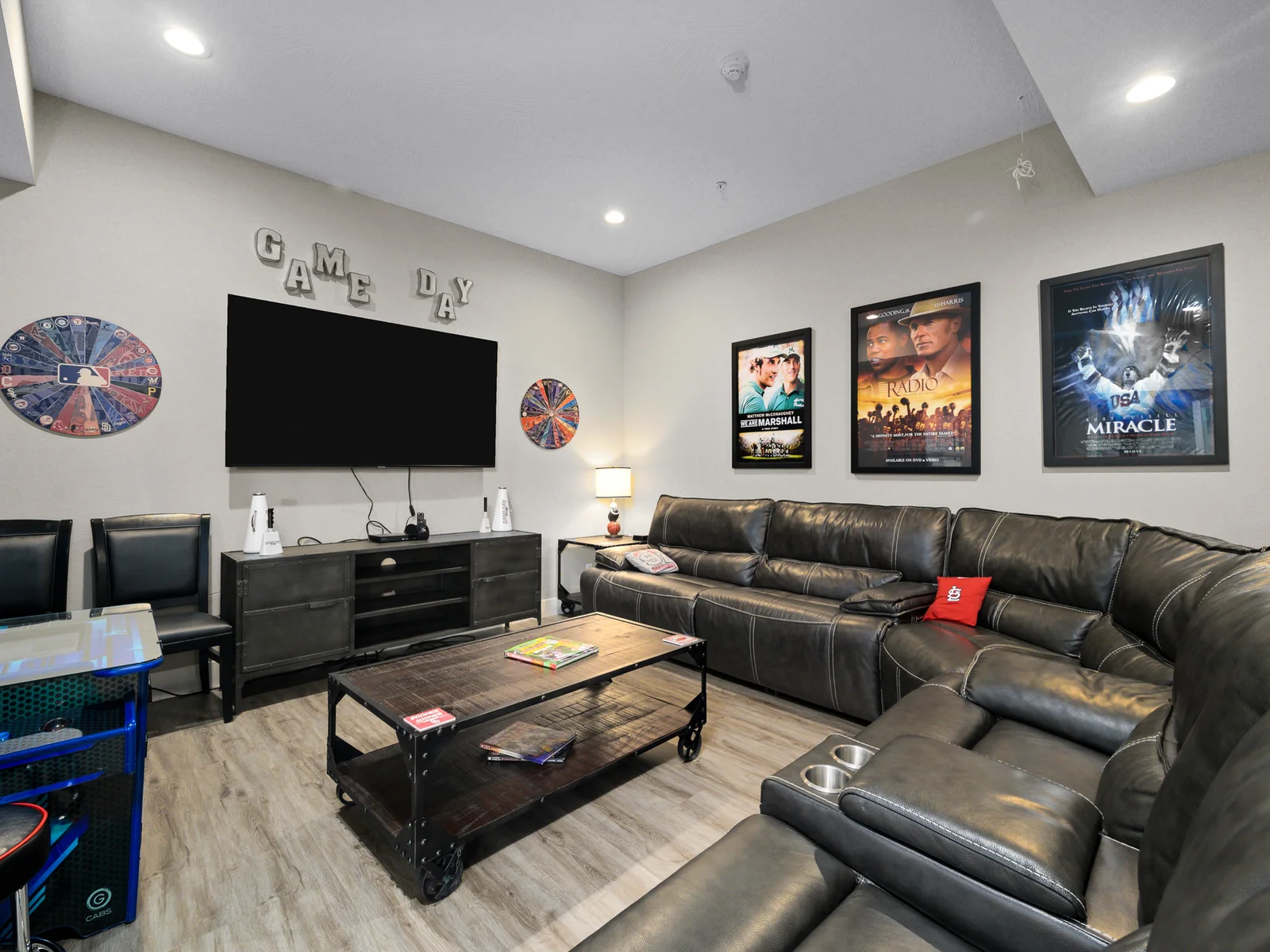 Cheer on your favorite team on this 75" TV and comfortable sectional