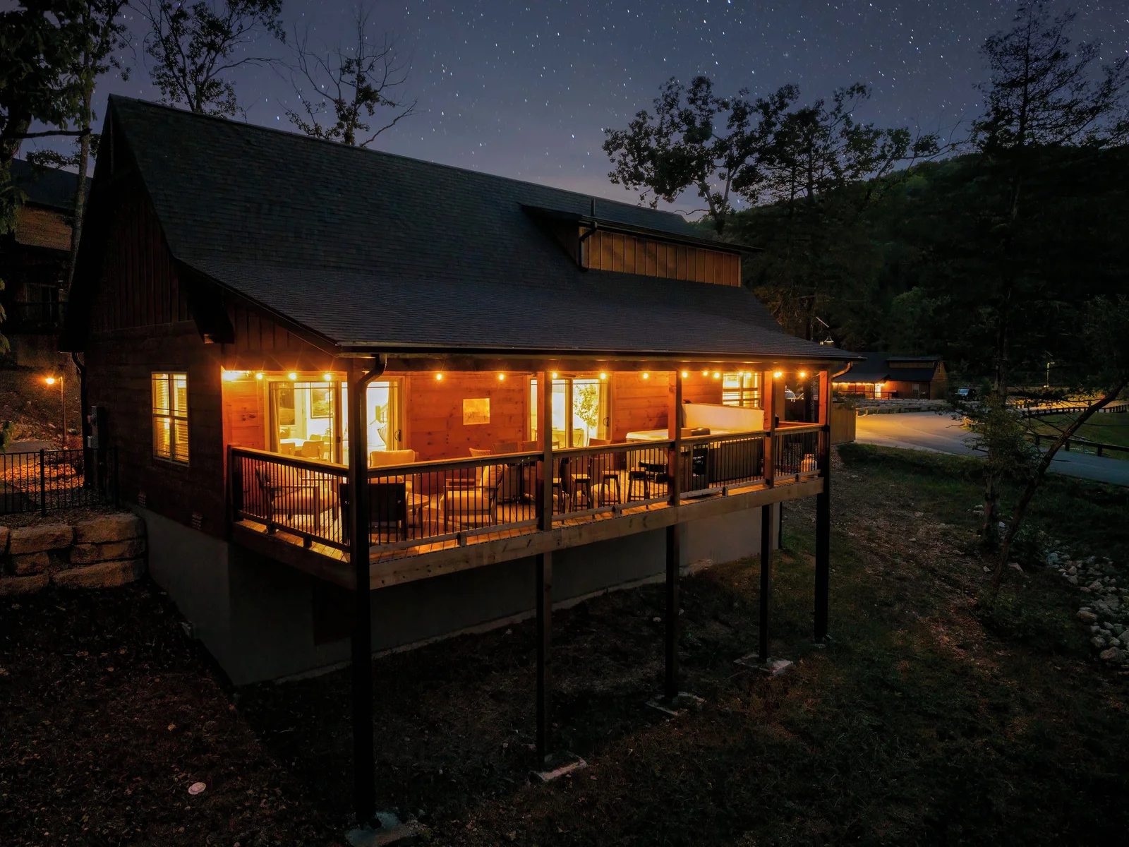 Back view of the cabin at night.