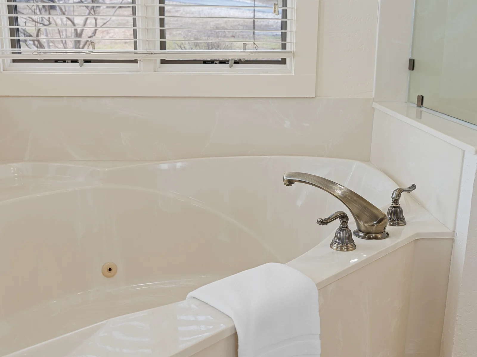 A deep soaking tub offers the perfect way to relax and recharge after long, active days.