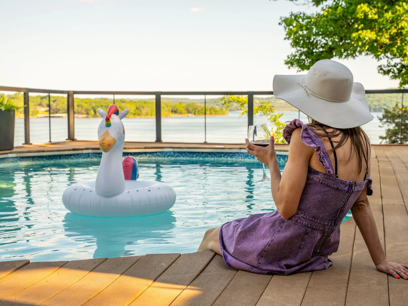 Lounge poolside with a drink in hand while the lake provides the perfect backdrop for your getaway.