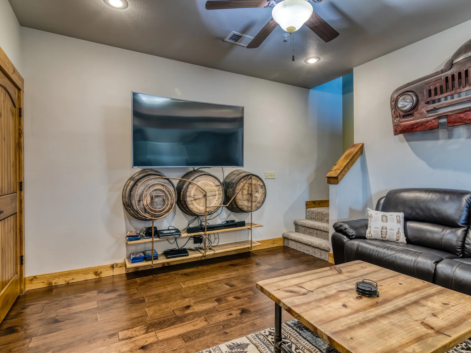 Lower level: This 65" curved TV is the perfect place to watch your favorite show!