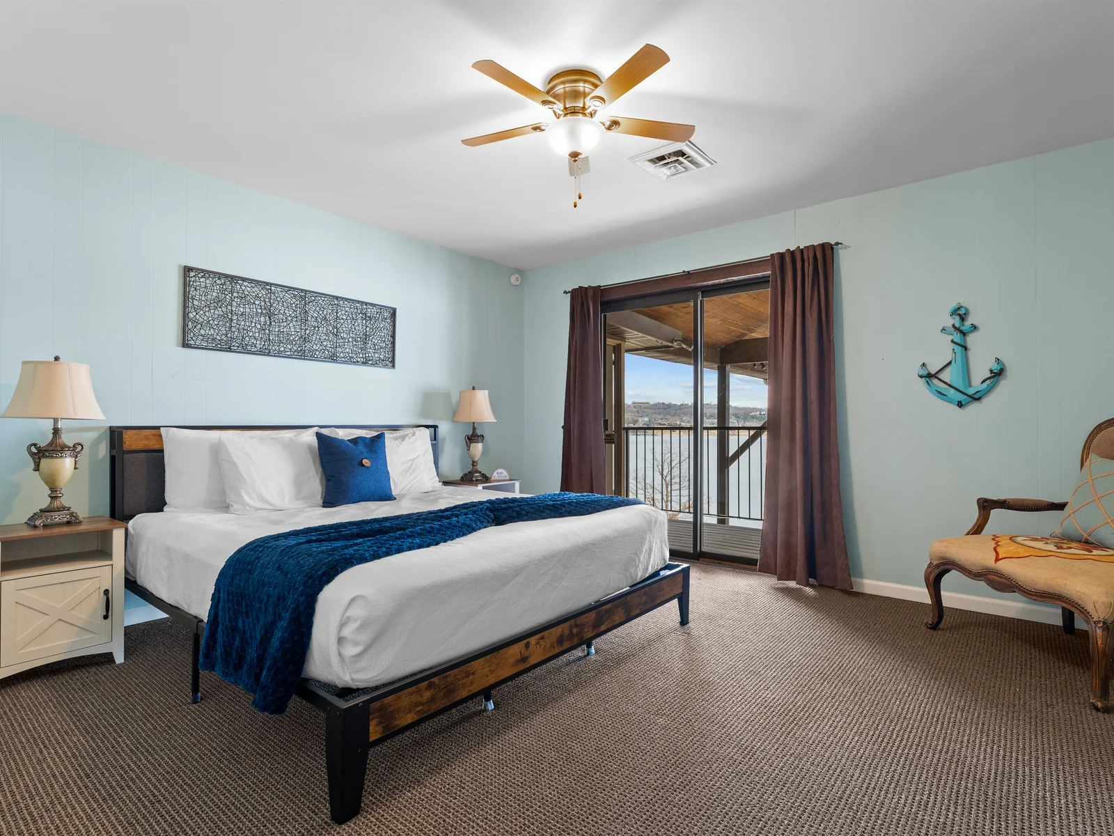 Comfortable bedding and soft light create a restful space to recharge after full days on the lake.