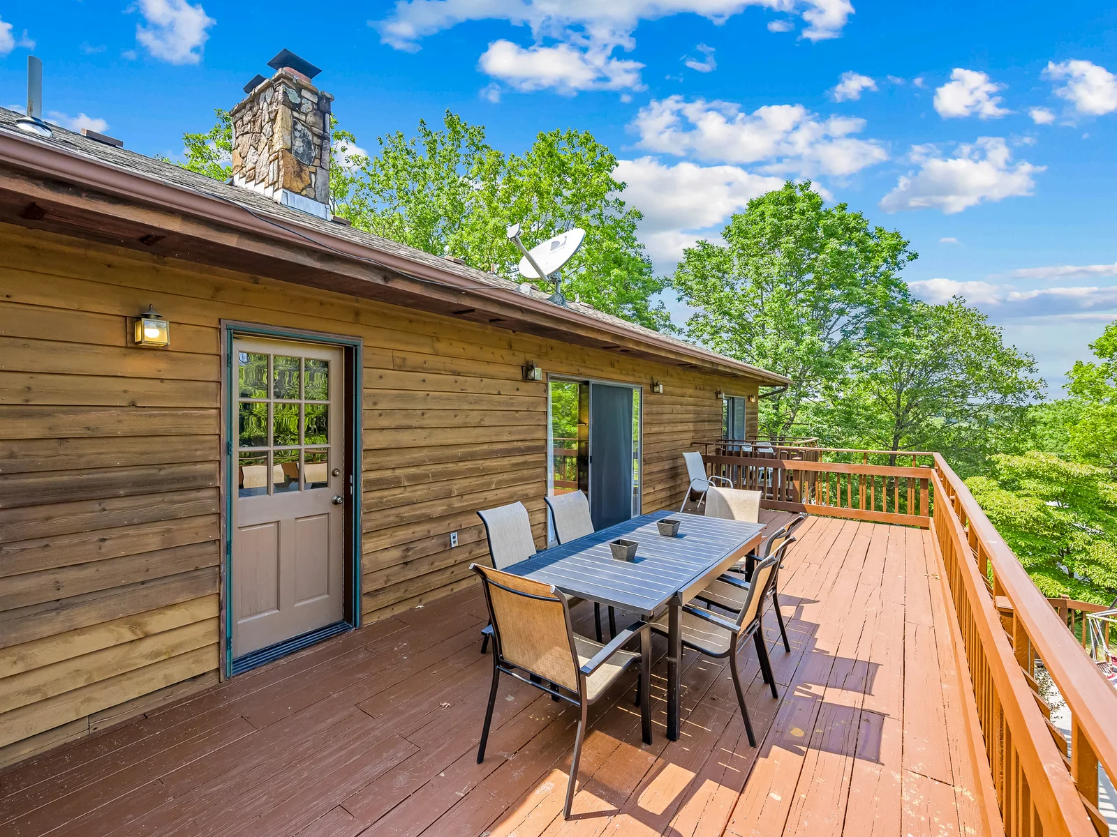 Deck seating overlooking the pool area.