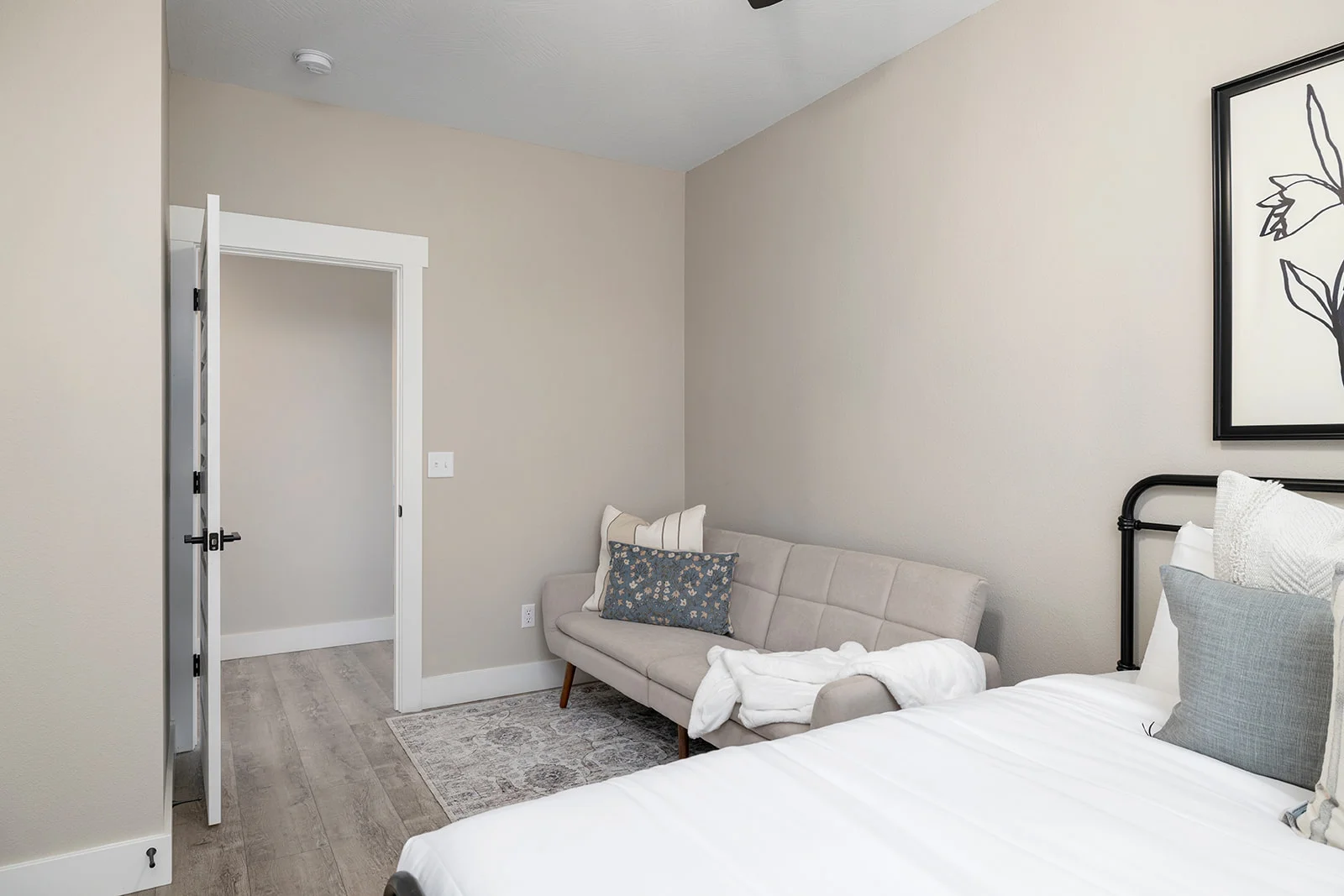Lower level King with futon