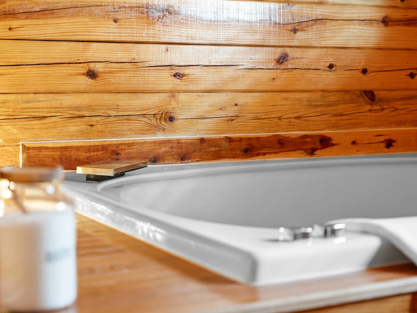 A steamy soak, bath salts, and cozy ambiance—yes, please