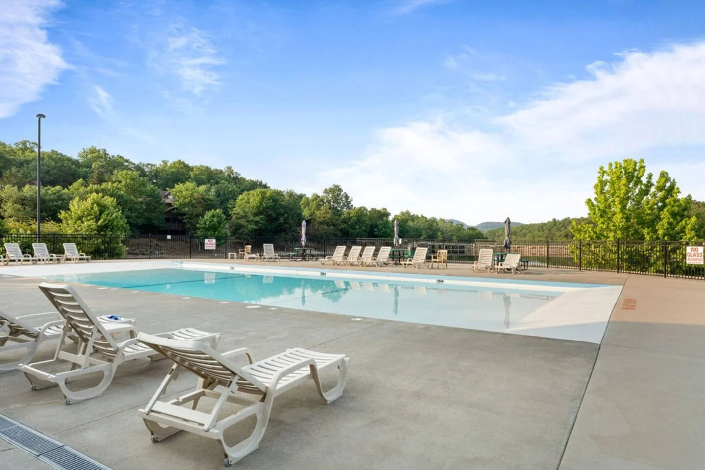Large zero-entry pool that overlooks the private lake. Walking distance from the cabin!