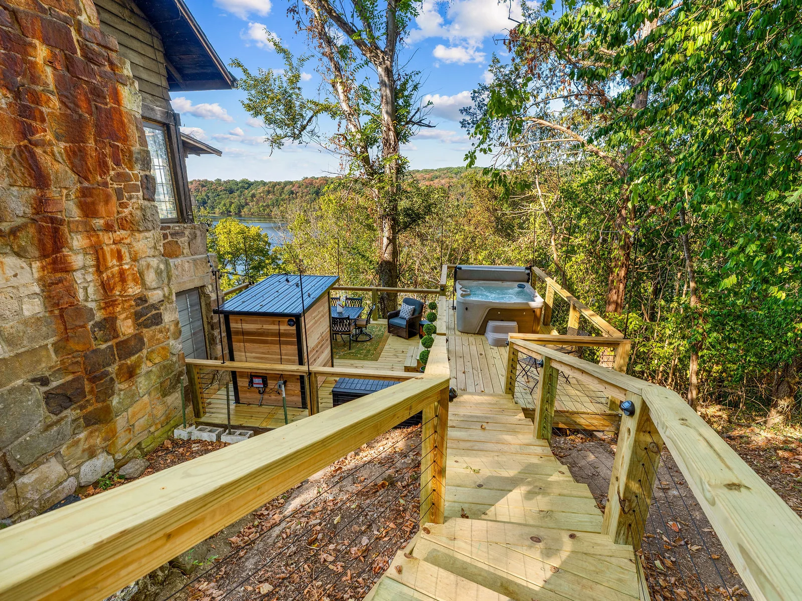 Follow the winding hillside walkway down to Cliff Haus’s newest outdoor escape—trust us, what’s waiting at the bottom is worth it. 🔥♨️