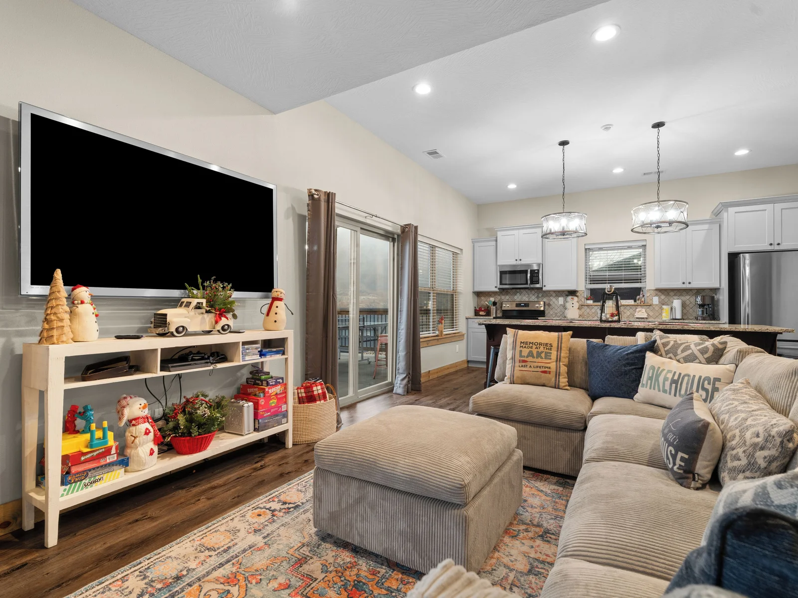 Lower level FULL kitchen. Refrigerator, dishwasher, oven/ceramic glass cooktop, microwave, drip coffee maker, Keurig, and Nespresso. Stocked with small appliances, cookware, bakeware, utensils, dishes, glassware, mugs, and more!