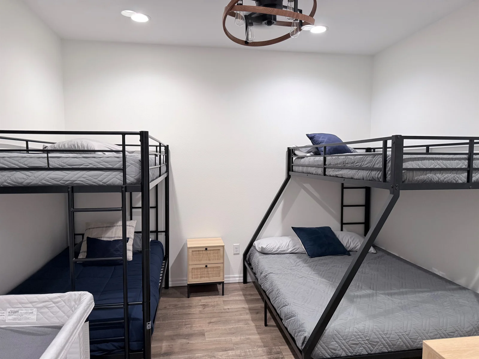 Bunk beds on right is a queen size bed